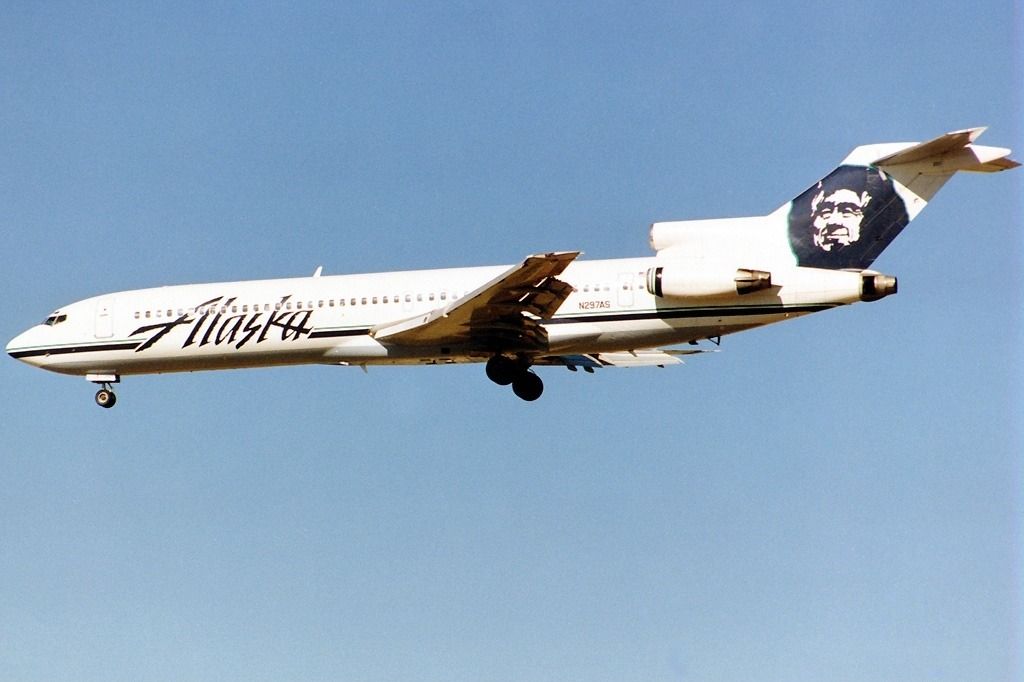 An Alaska Airlines Boeing 727 Flying In The Sky.