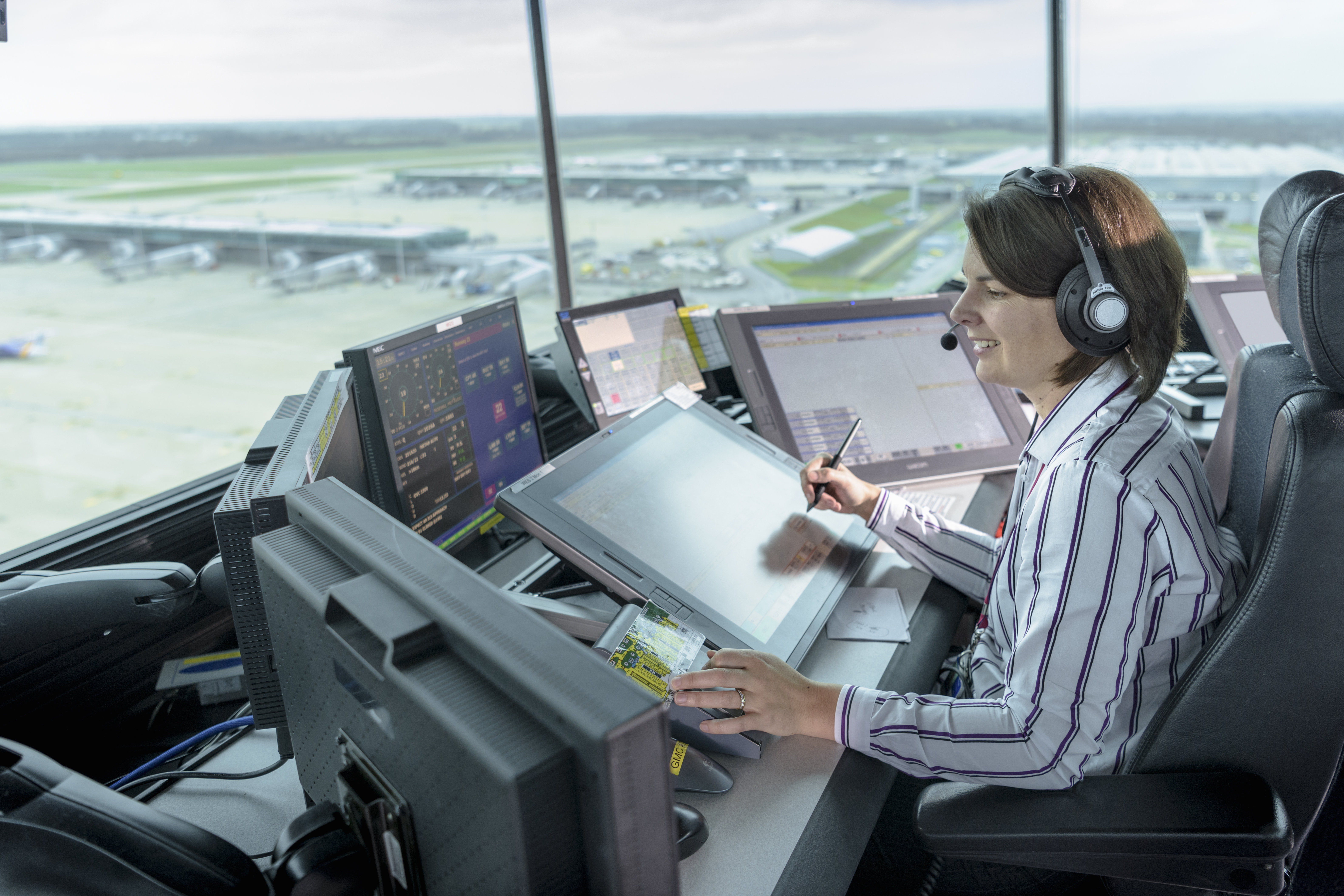 air traffic controller working in a tower