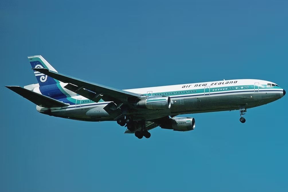 An Air New Zealand McDonnell Douglas DC-10 flying in the sky.