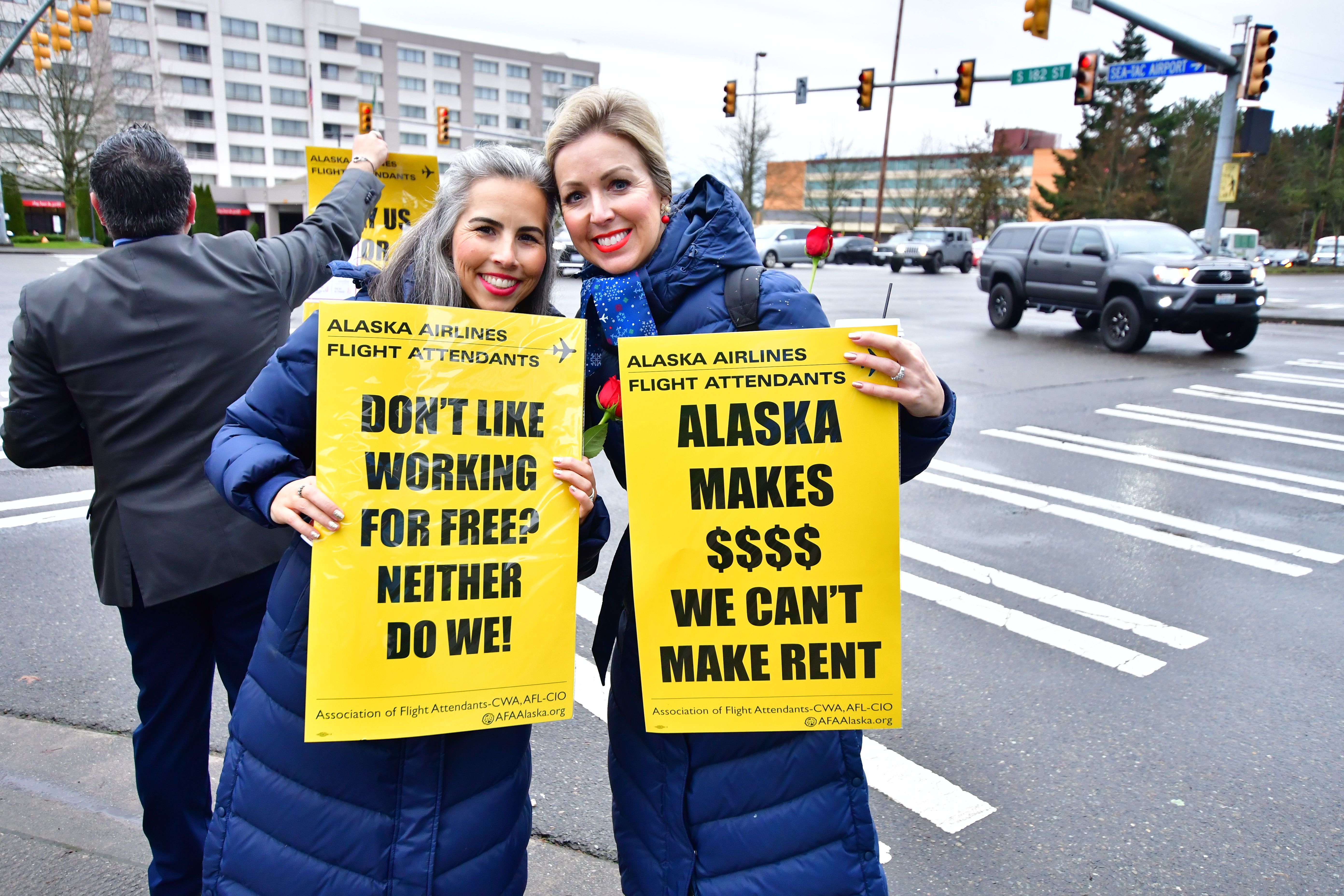 DSC_3958 - Two Alaska Airlines flight attendants picketing at busy SeaTac intersection