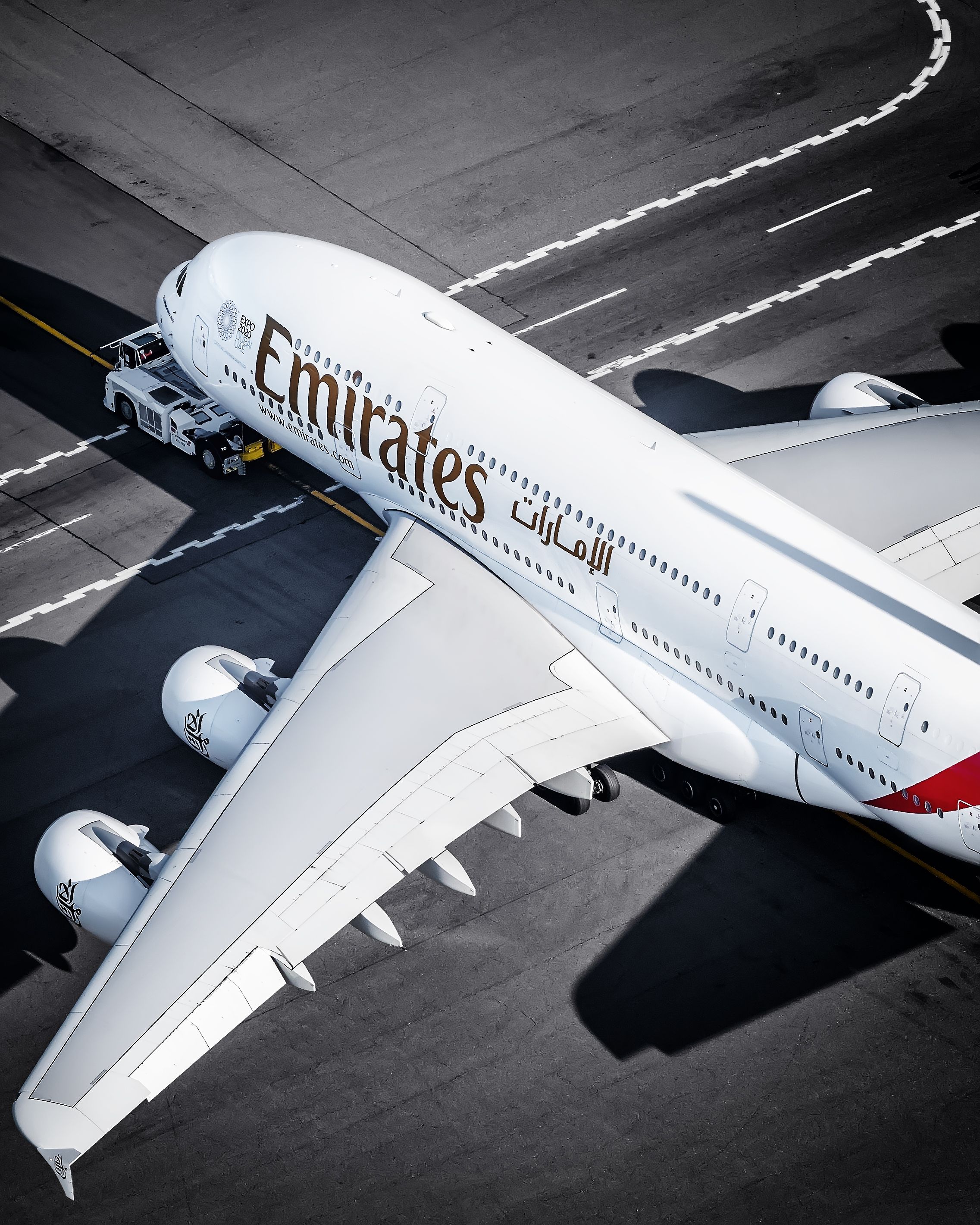 AN Emirates Airbus A380 on an airport apron.