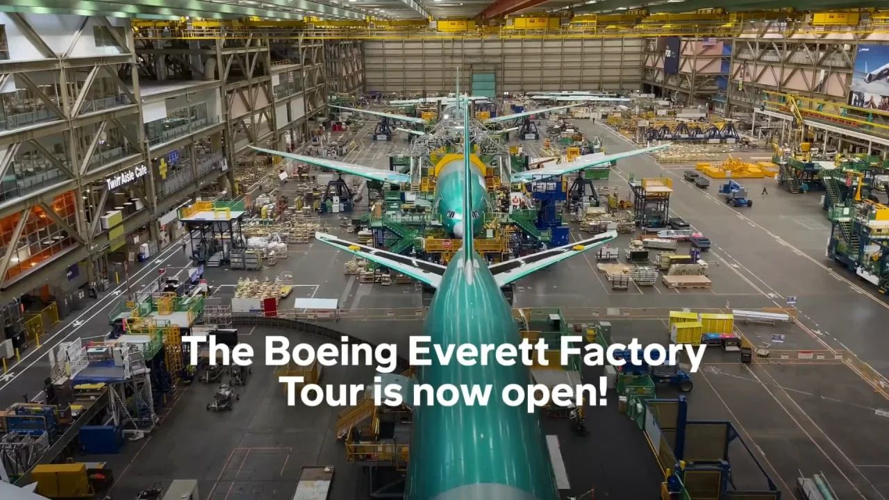 Several Boeing aircraft being manufactured.