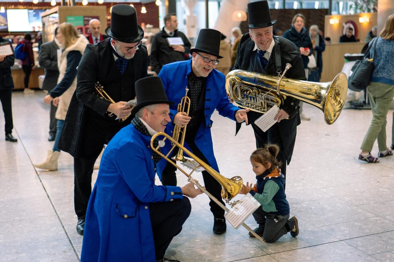 The Heathrow Brass Quintet playing in the terminal.