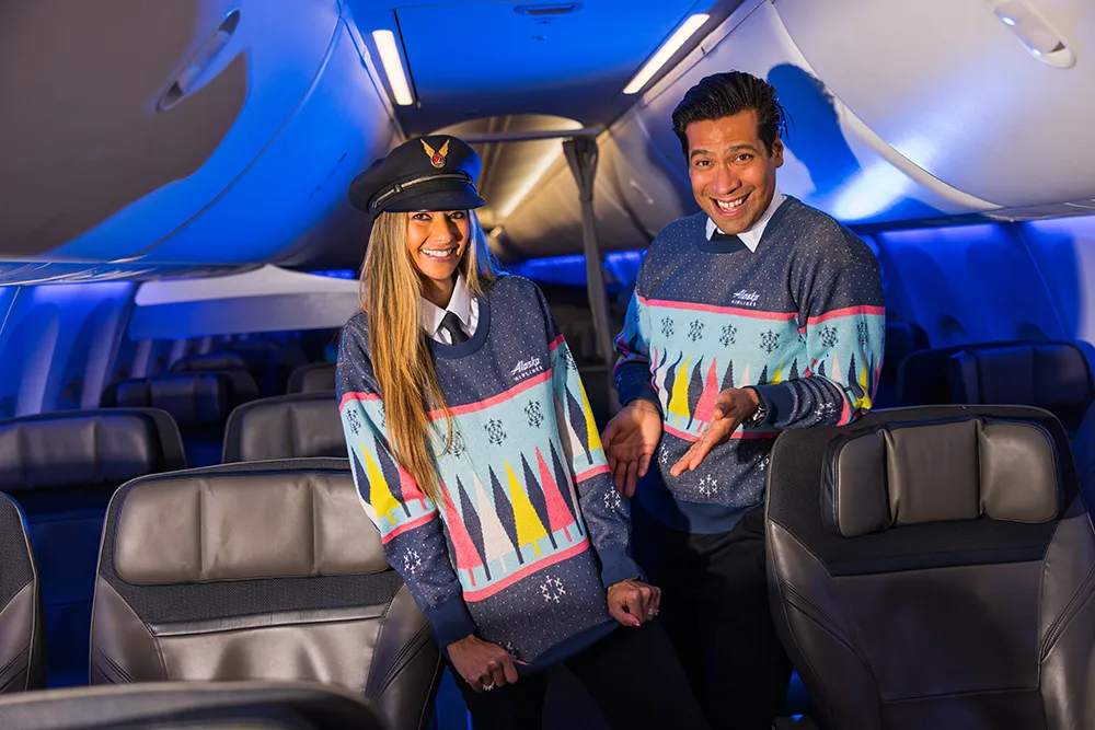 Alaska Airlines Crew In Christmas Jumpers Onboard An Aircraft