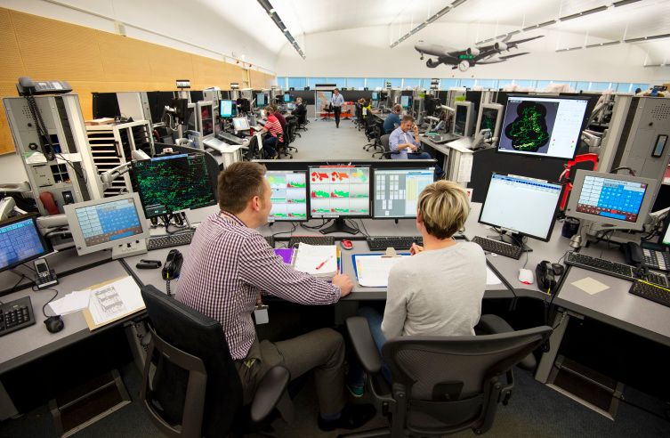 Air traffic controllers at work in the tower.