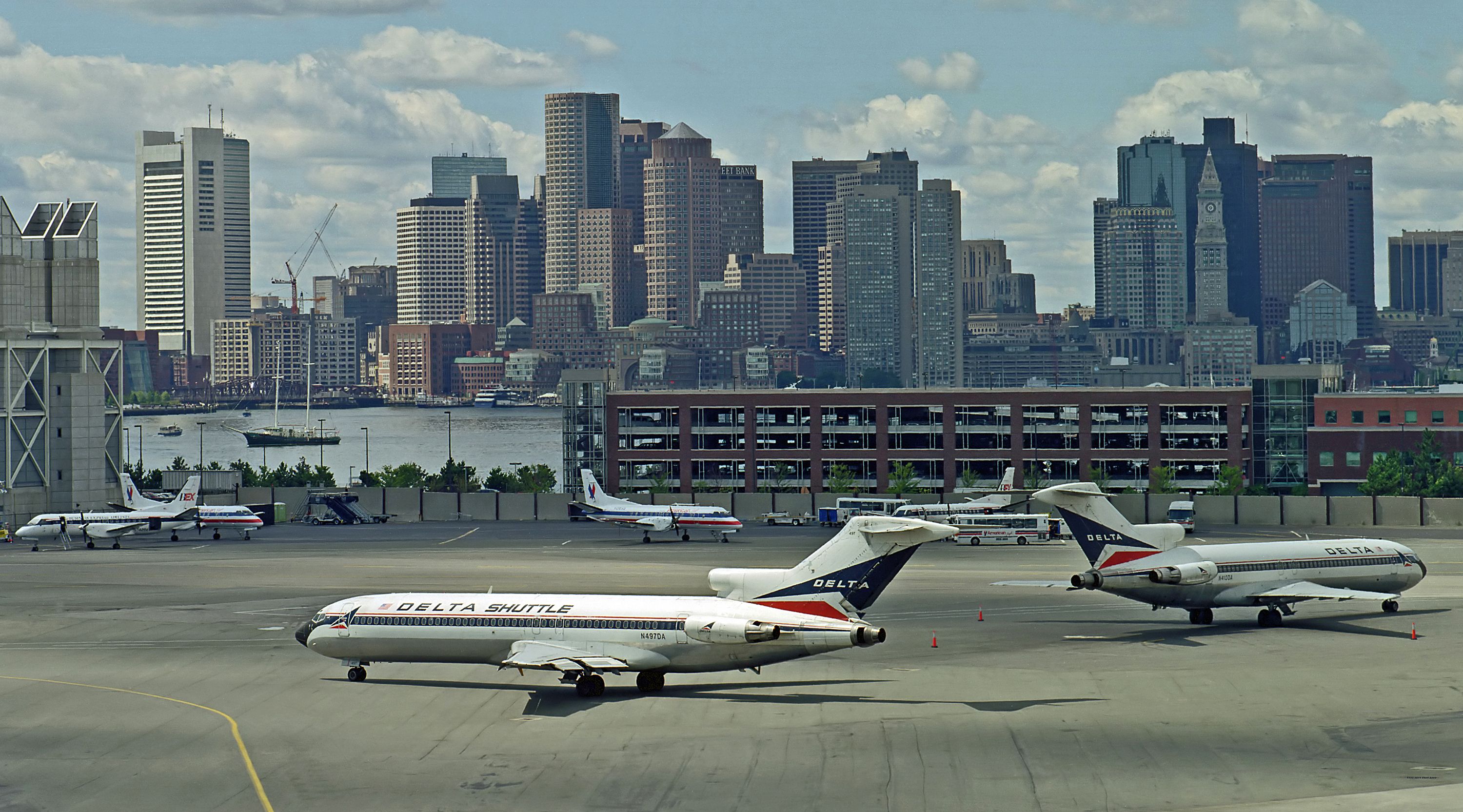 Multiple Delta Air Lines Boeing 727s on an airport apron.
