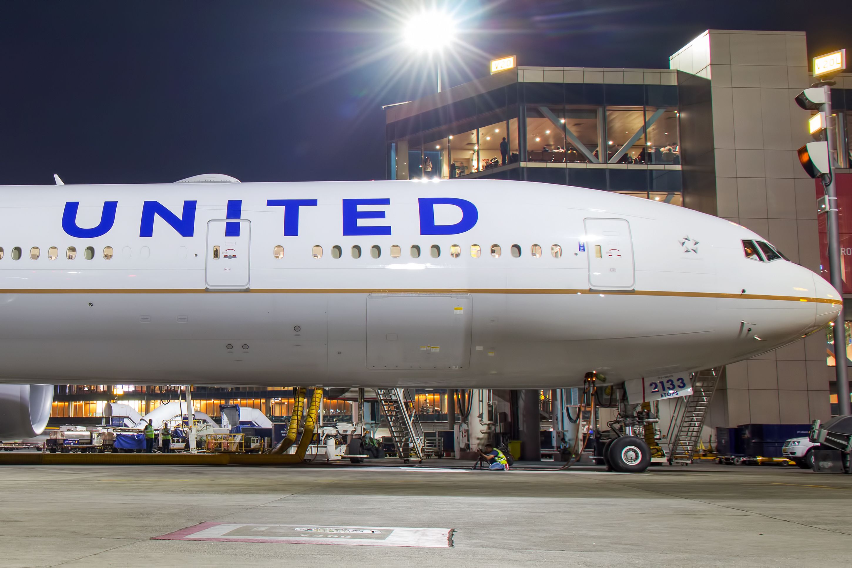 United Airlines Boeing 777 parked at the airport