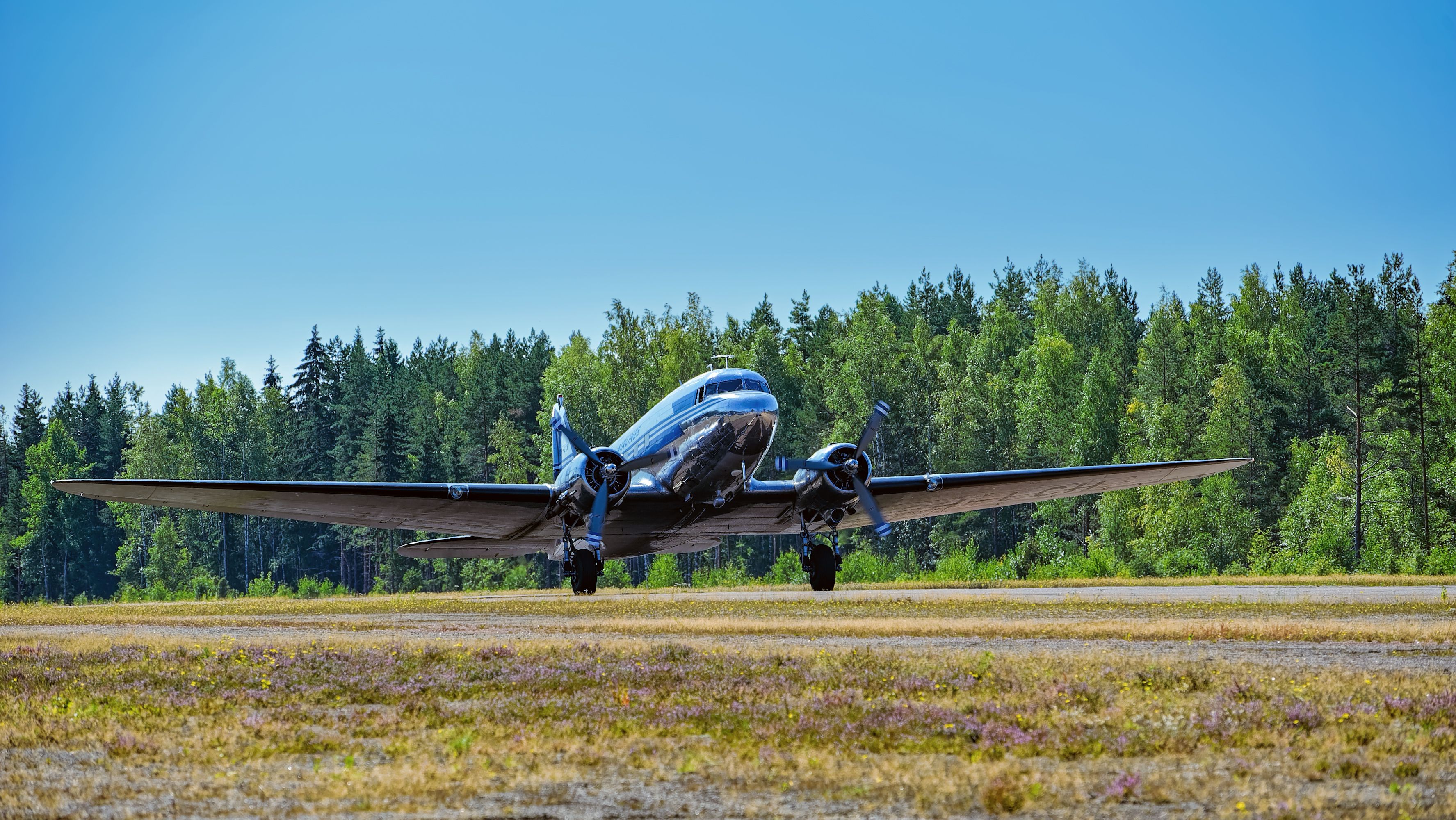 A DC-3 taking off.