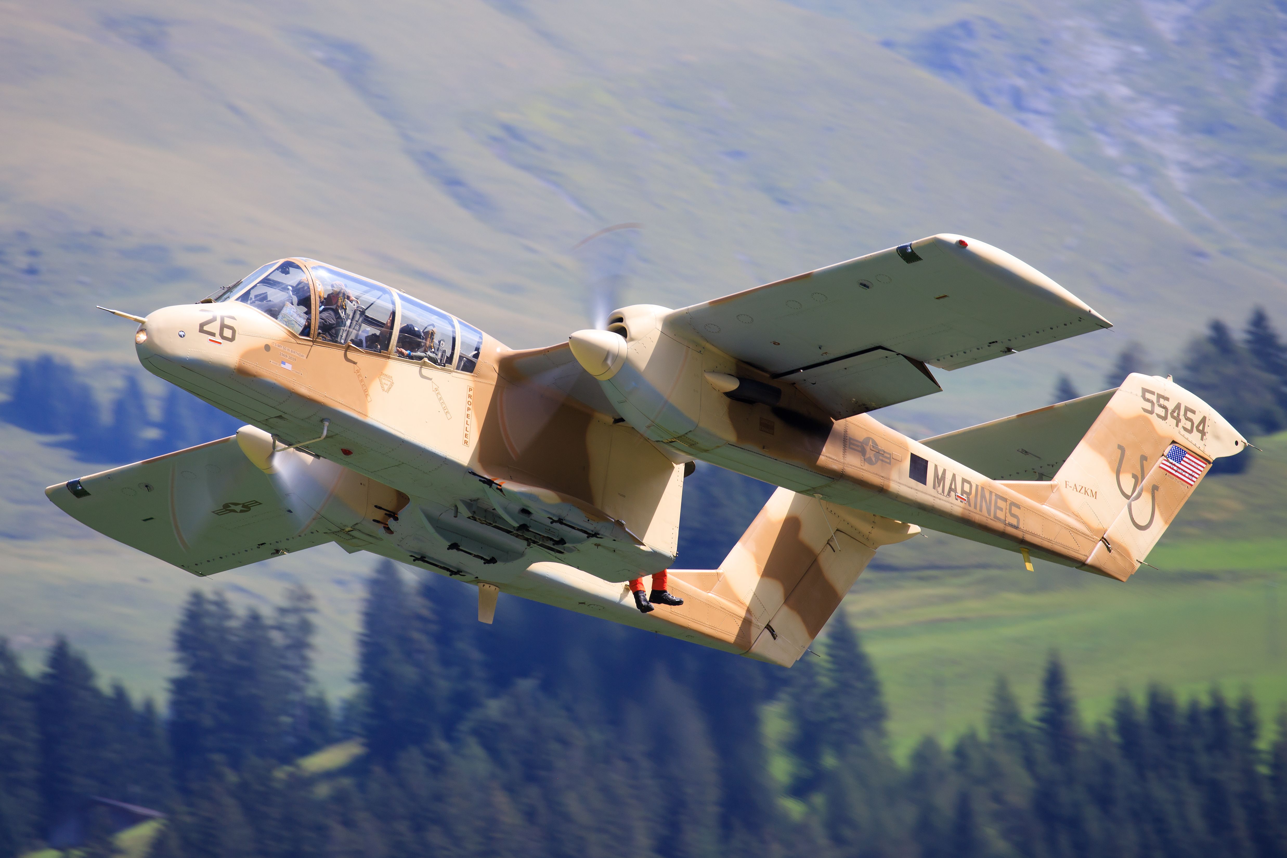 A Vintage Rockwell OV-10 Bronco just after take off.