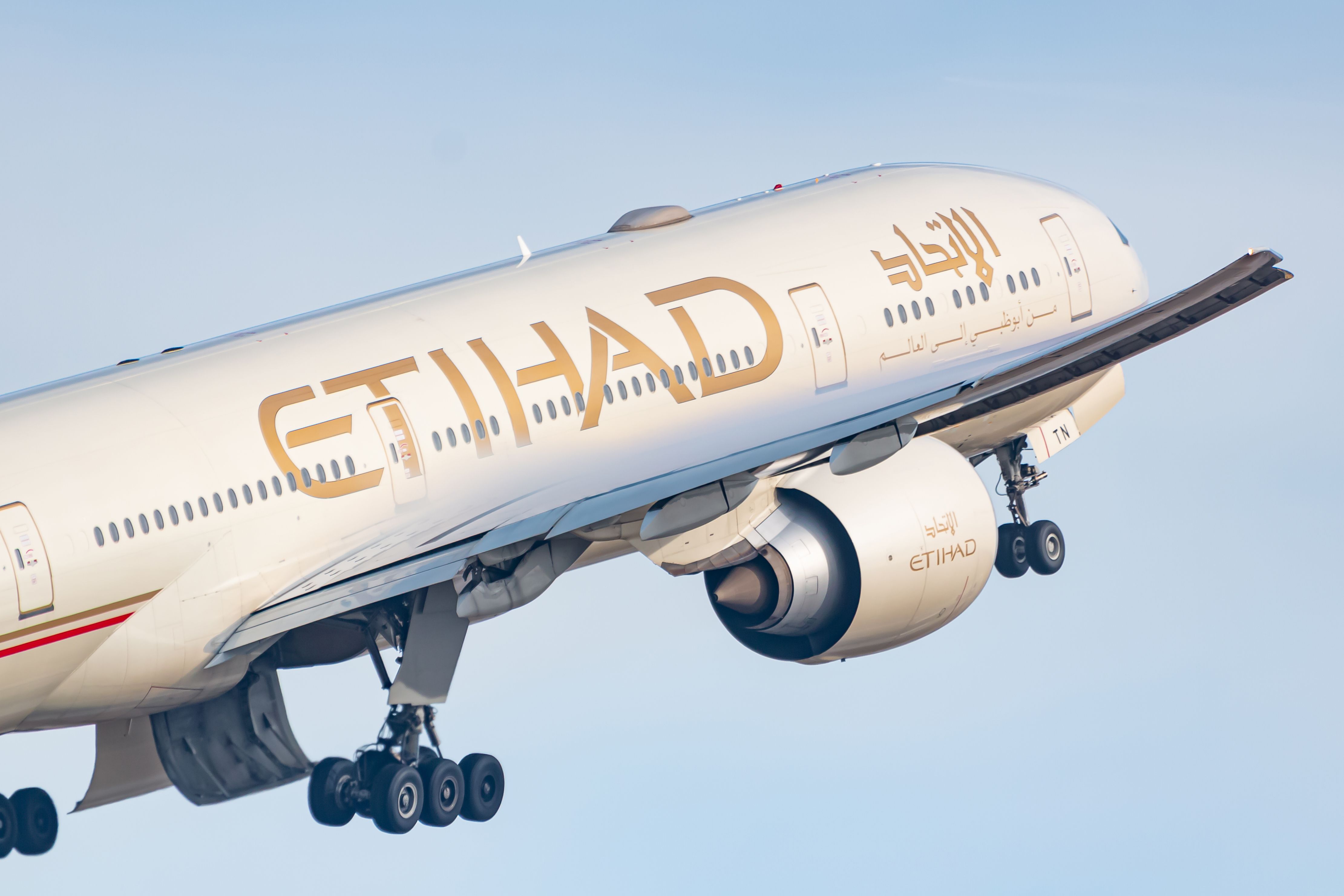 An Etihad Airways Boeing 777 flying in the sky. 