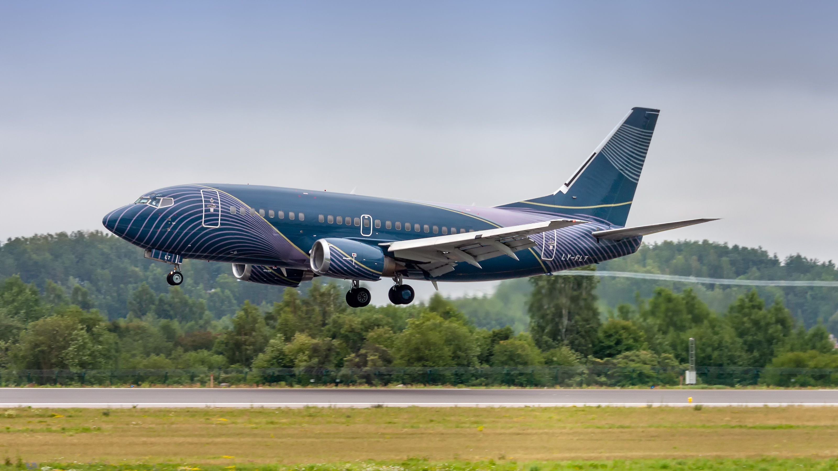 A KlasJet's Boeing 737-500 BBJ in a distinct livery