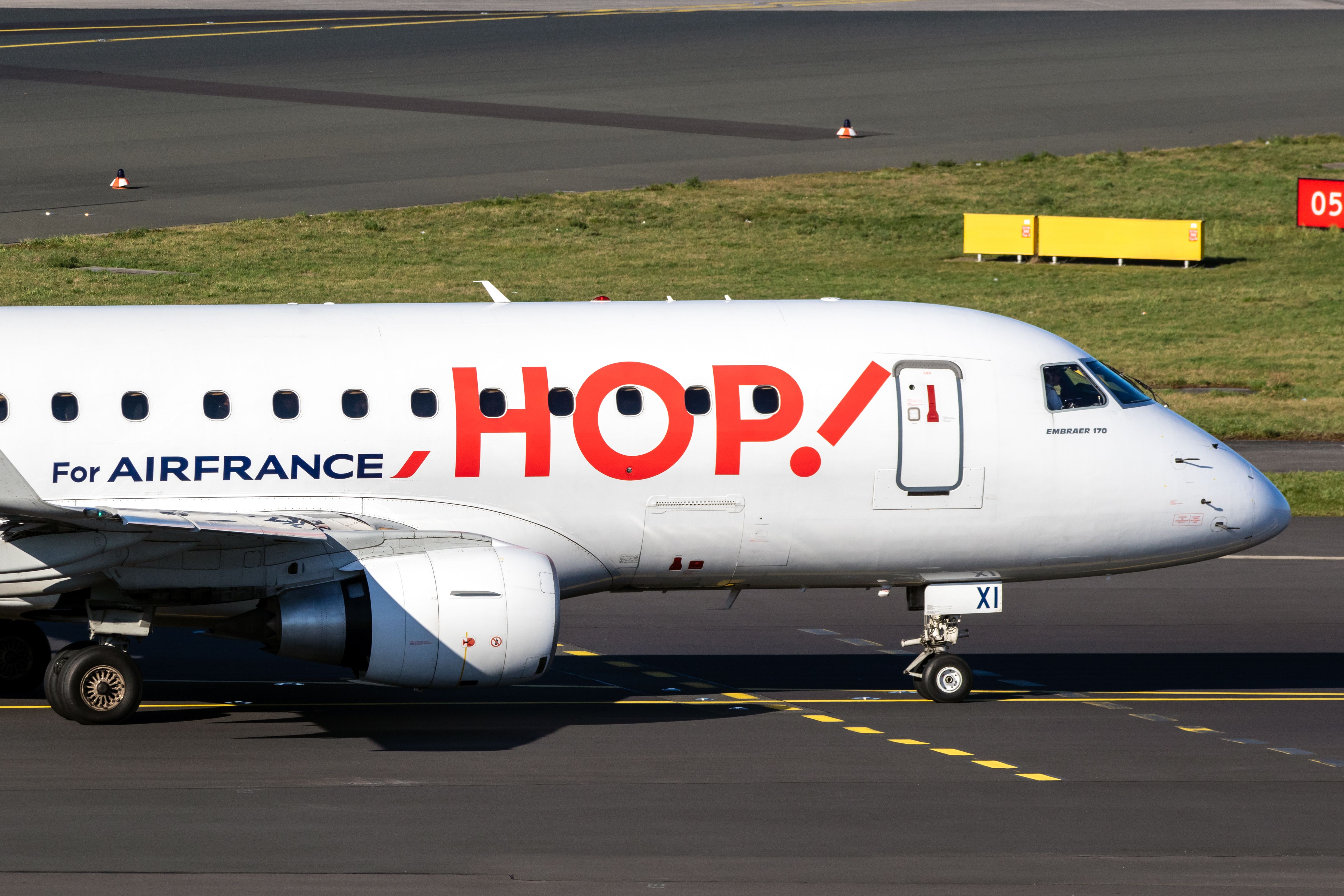 Air France Hop Embraer E170STD passenger plane taxiing after landing at Dusseldorf Airport