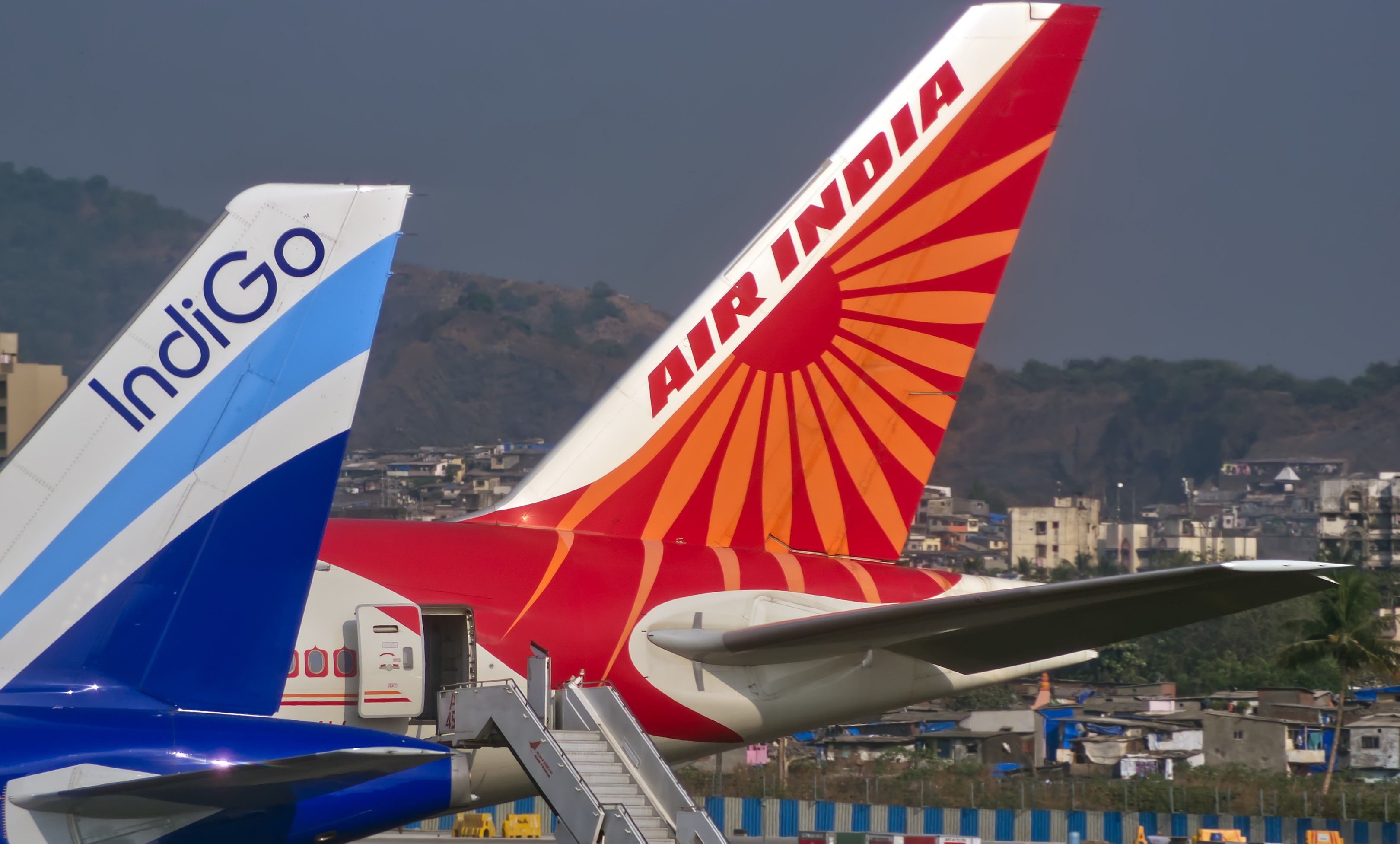 Air India and IndiGo planes parked at Mumbai Airport