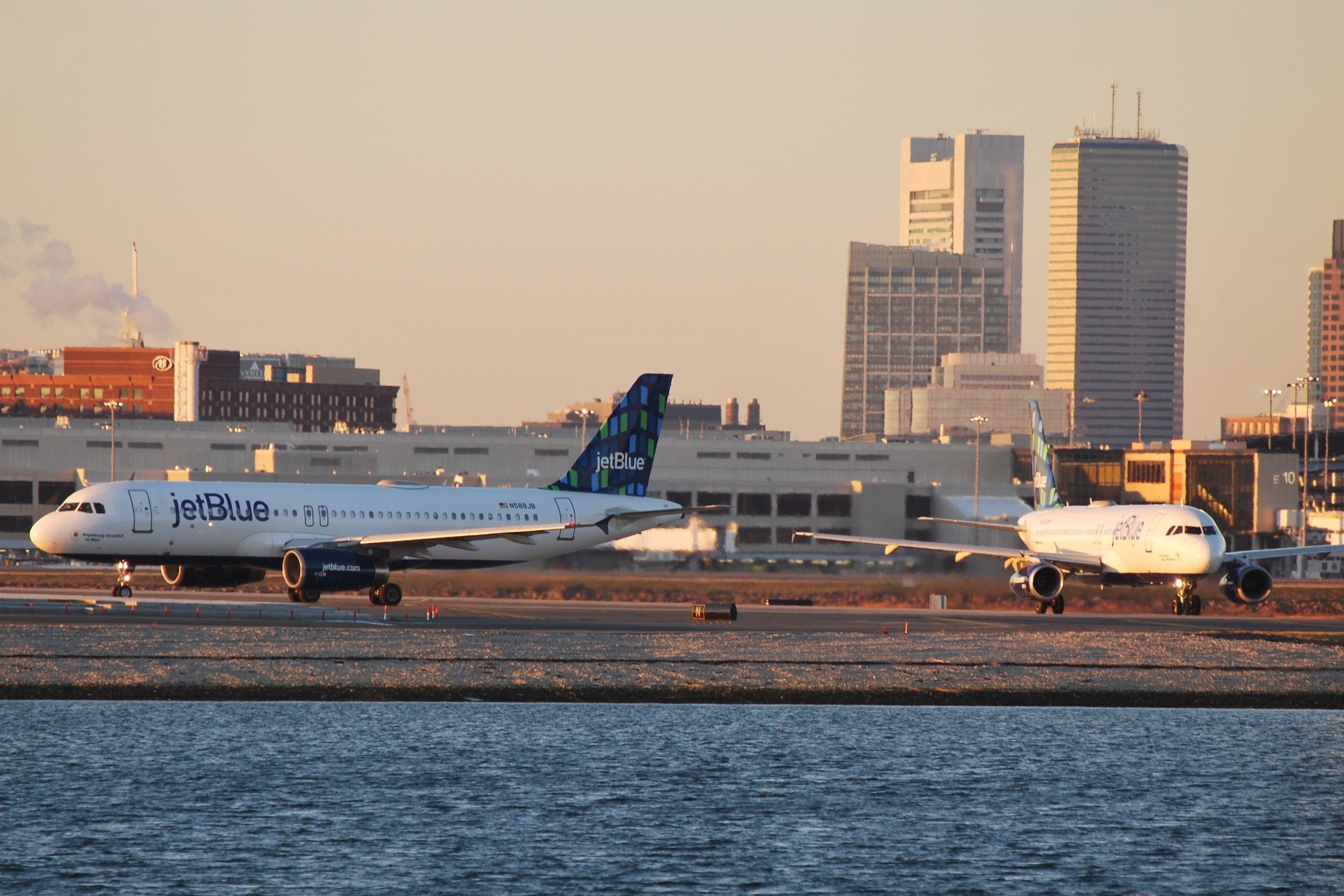 JetBlue Airways Airbus and Embraer jetliners at Boston Logan International Airport (BOS).