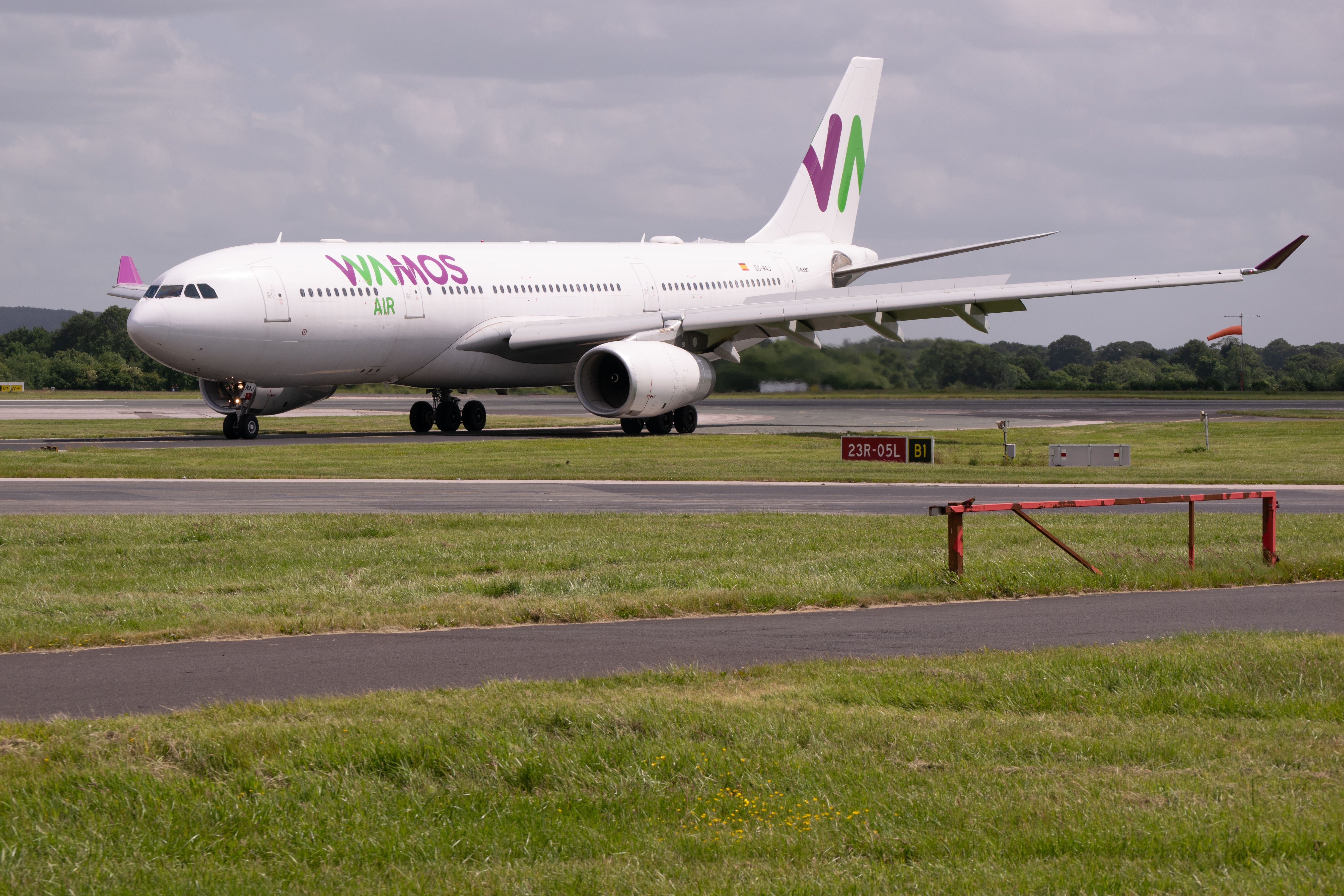 Wamos Air Airbus A330 on runway at Manchester Airport