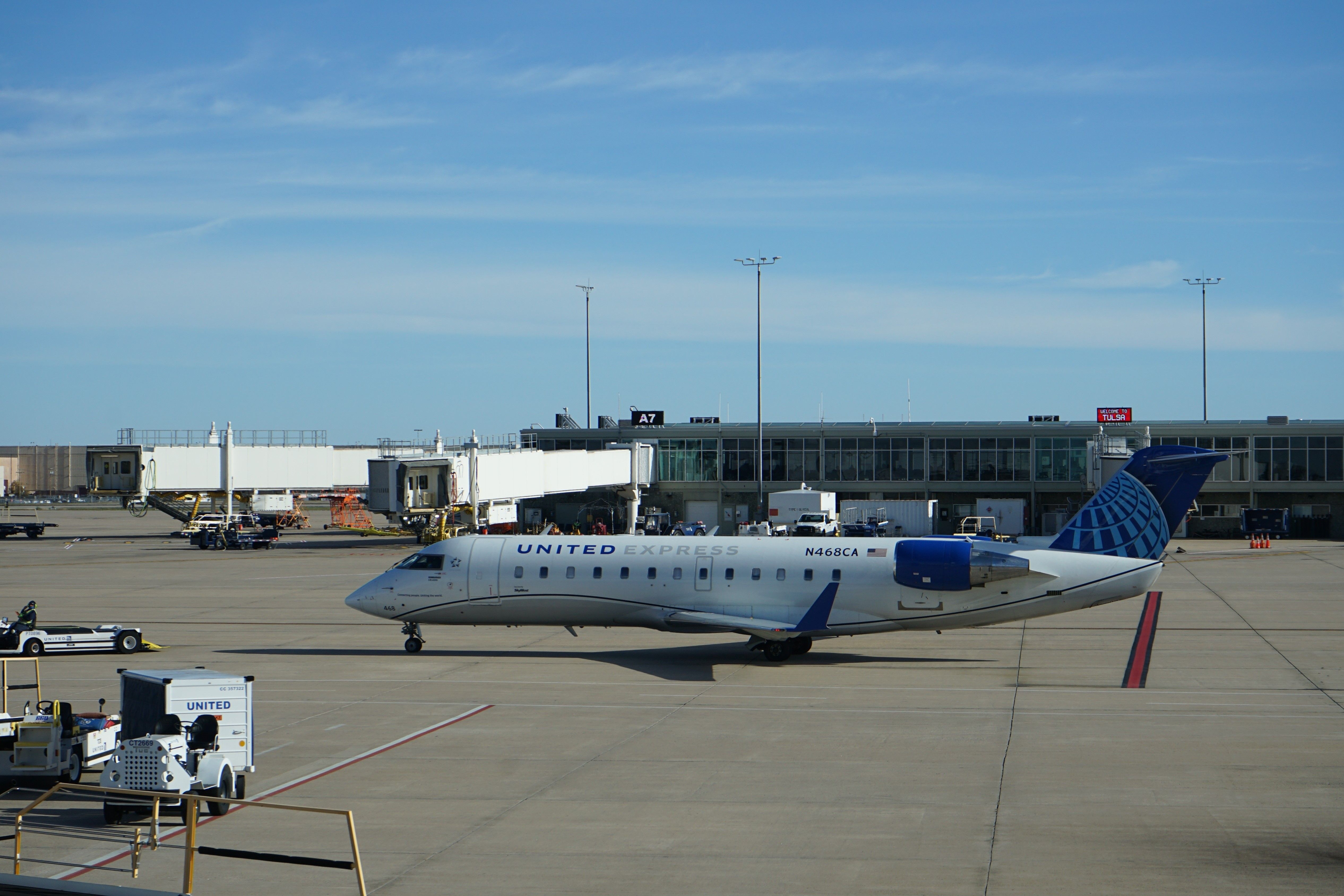 United Express Bombardier CRJ-200 departs at Tulsa International Airport
