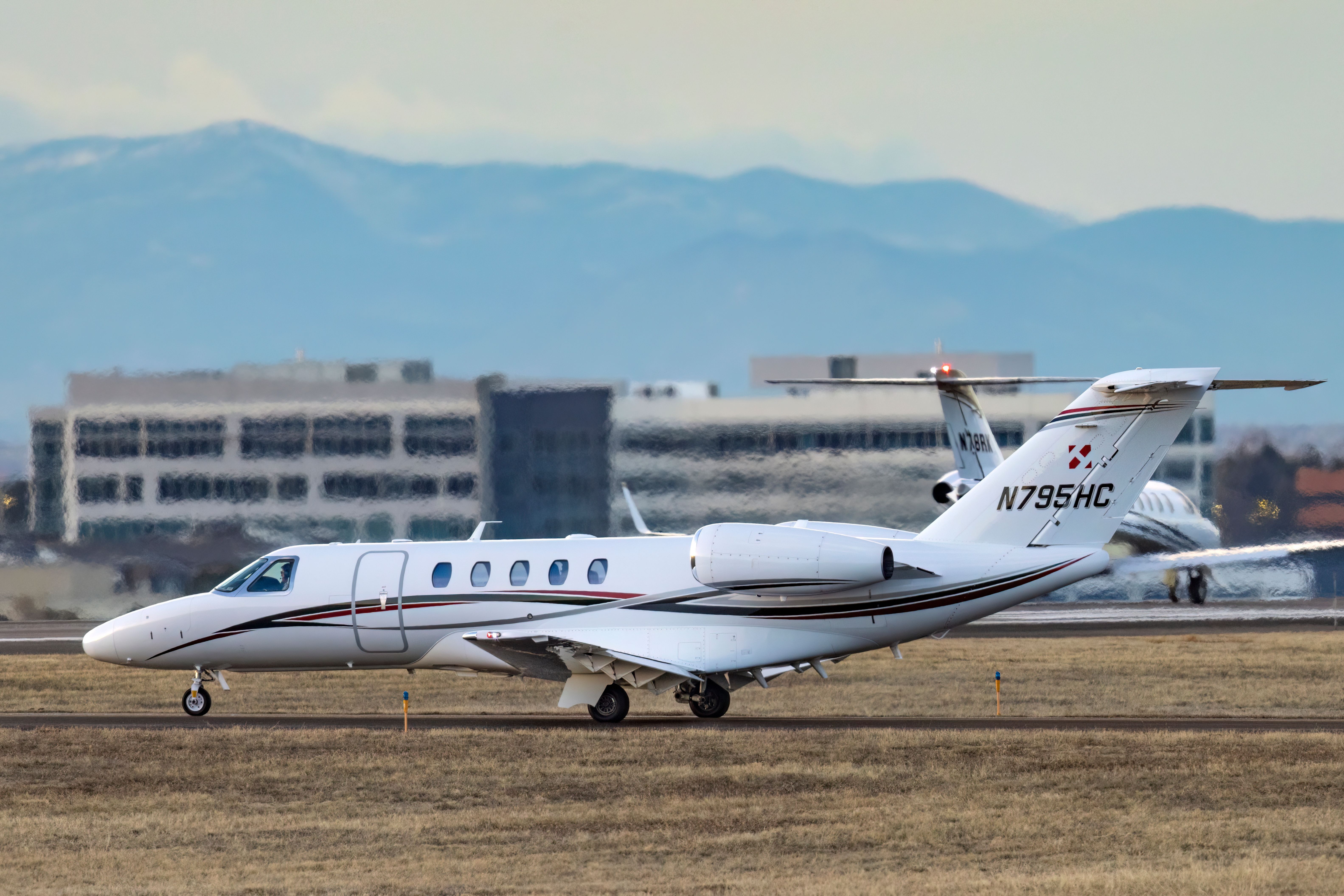 A Cessna Citation CJ4 on a taxiway.