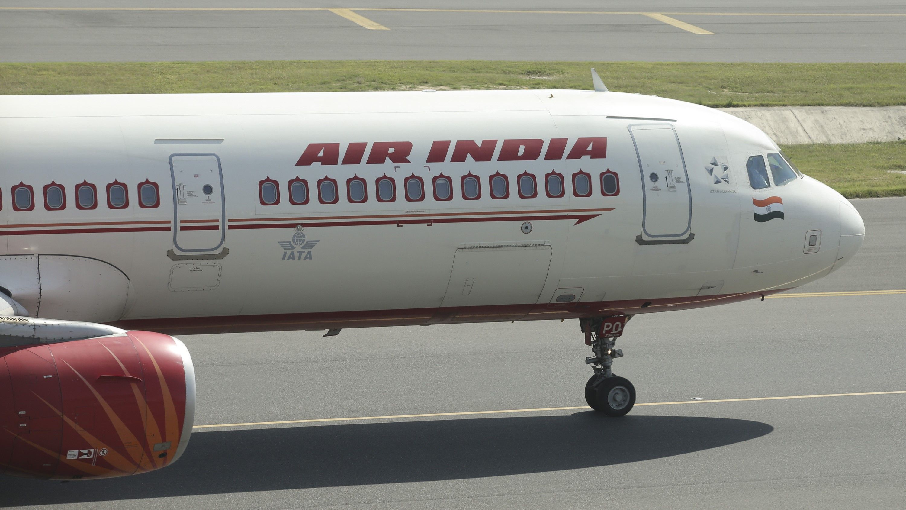 Air India Airbus A320 aircraft in Delhi Airport going to the the terminal through the taxiway