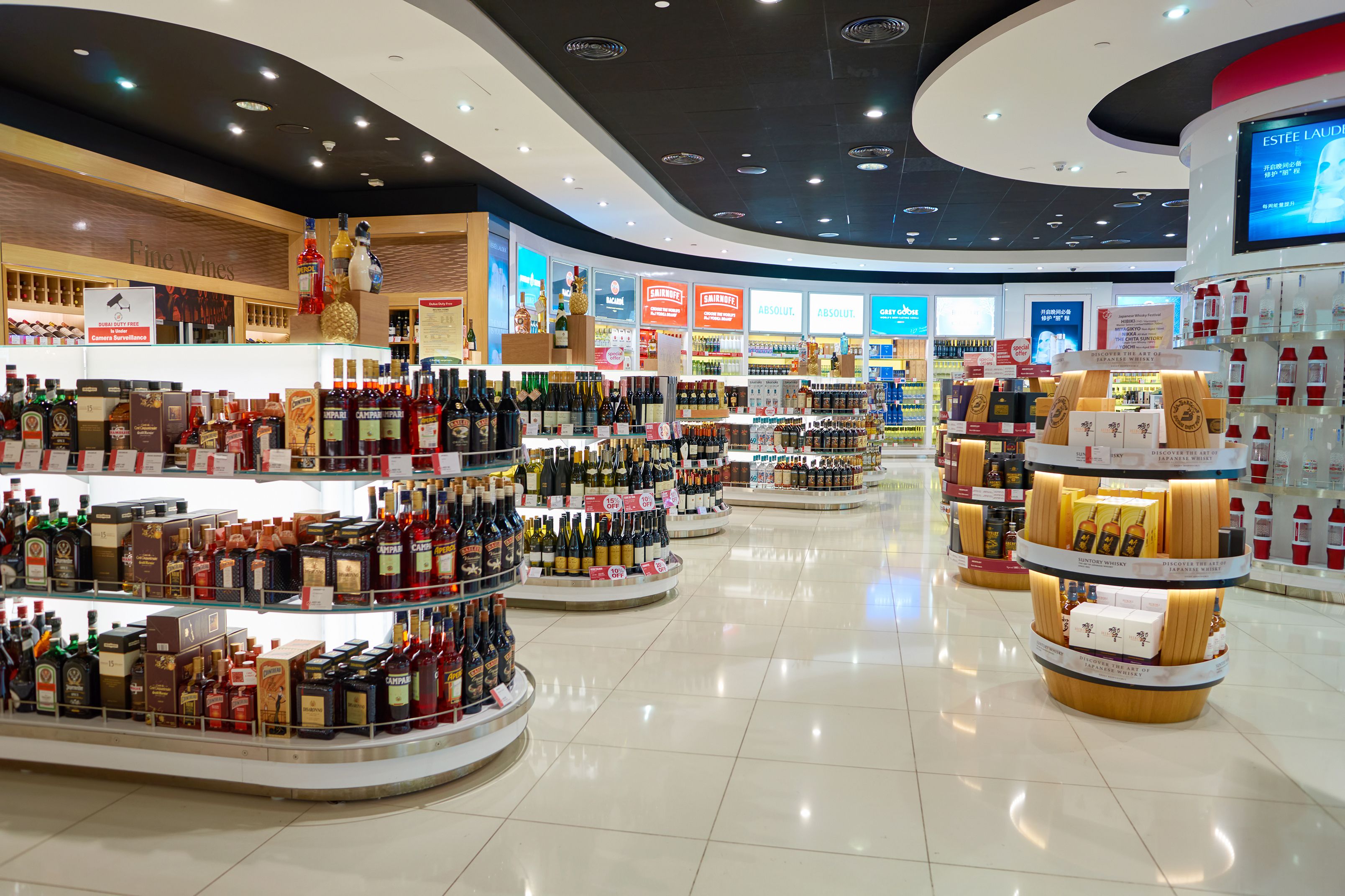 A wide selection of spirits available in Dubai International Airport's Duty Free section.