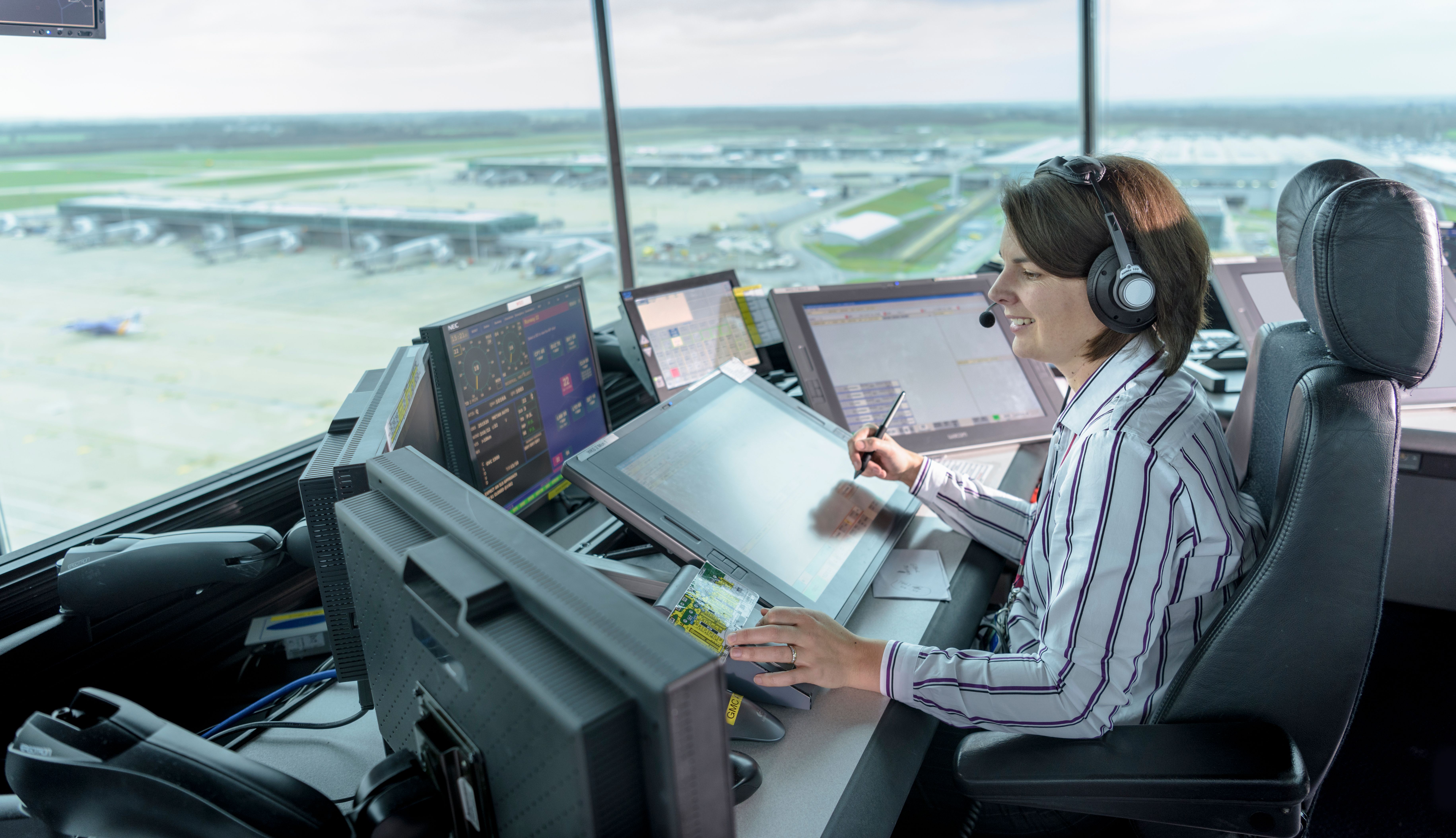 air traffic controller working in a tower