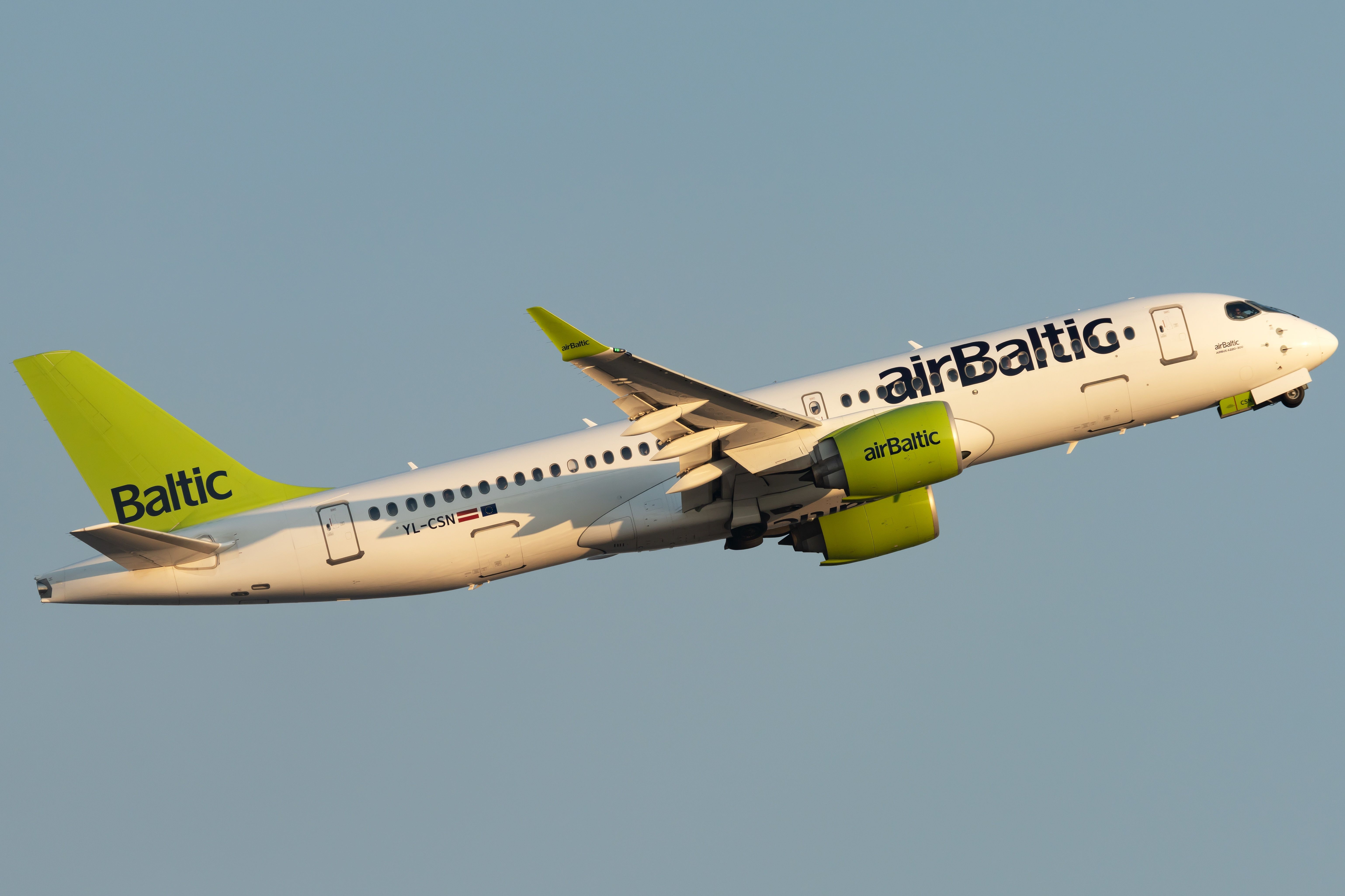 airBaltic Airbus A220-300 taking off from Rome Fiumicino Airport.