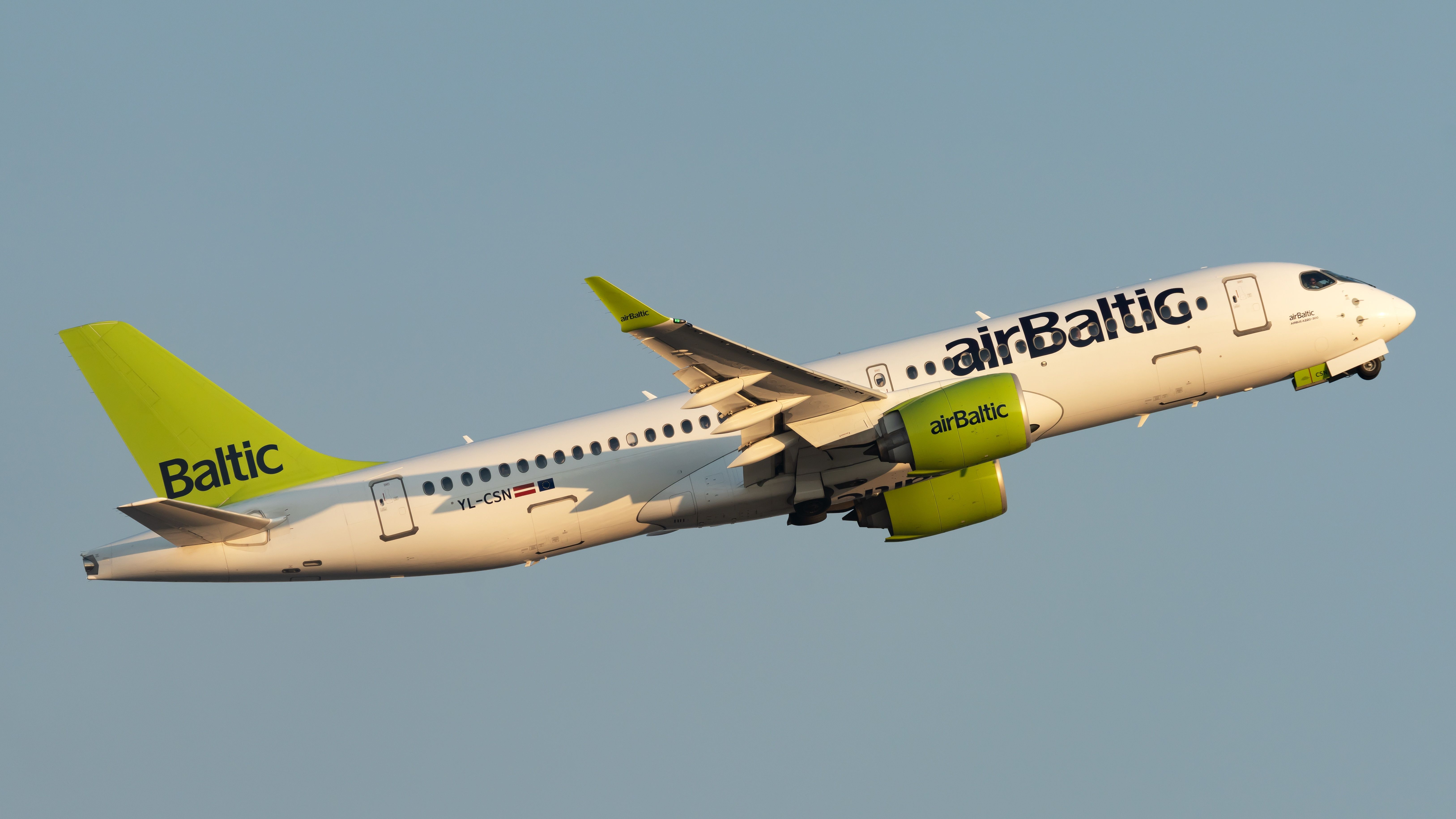 airBaltic Airbus A220-300 taking off from Rome Fiumicino Airport.