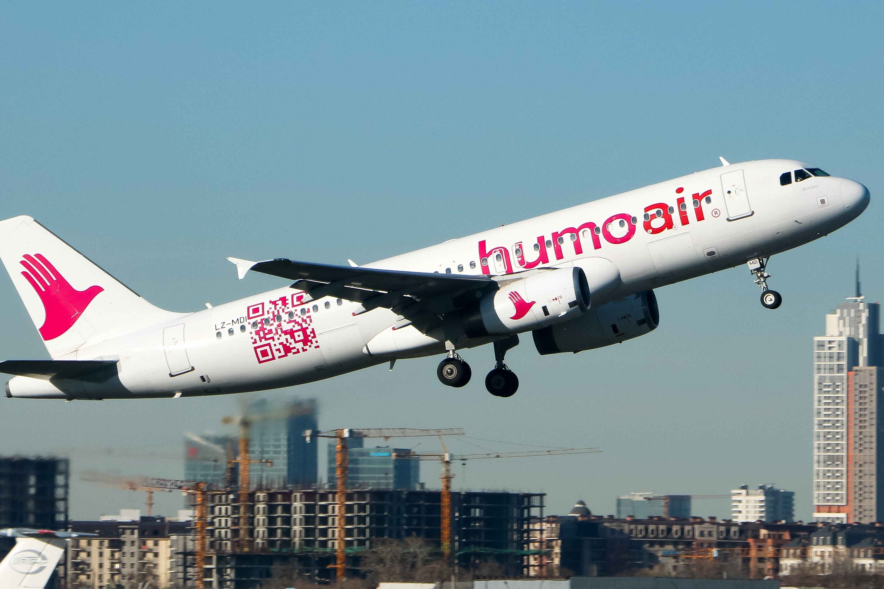 HUMO Air Airbus A320 taking off.