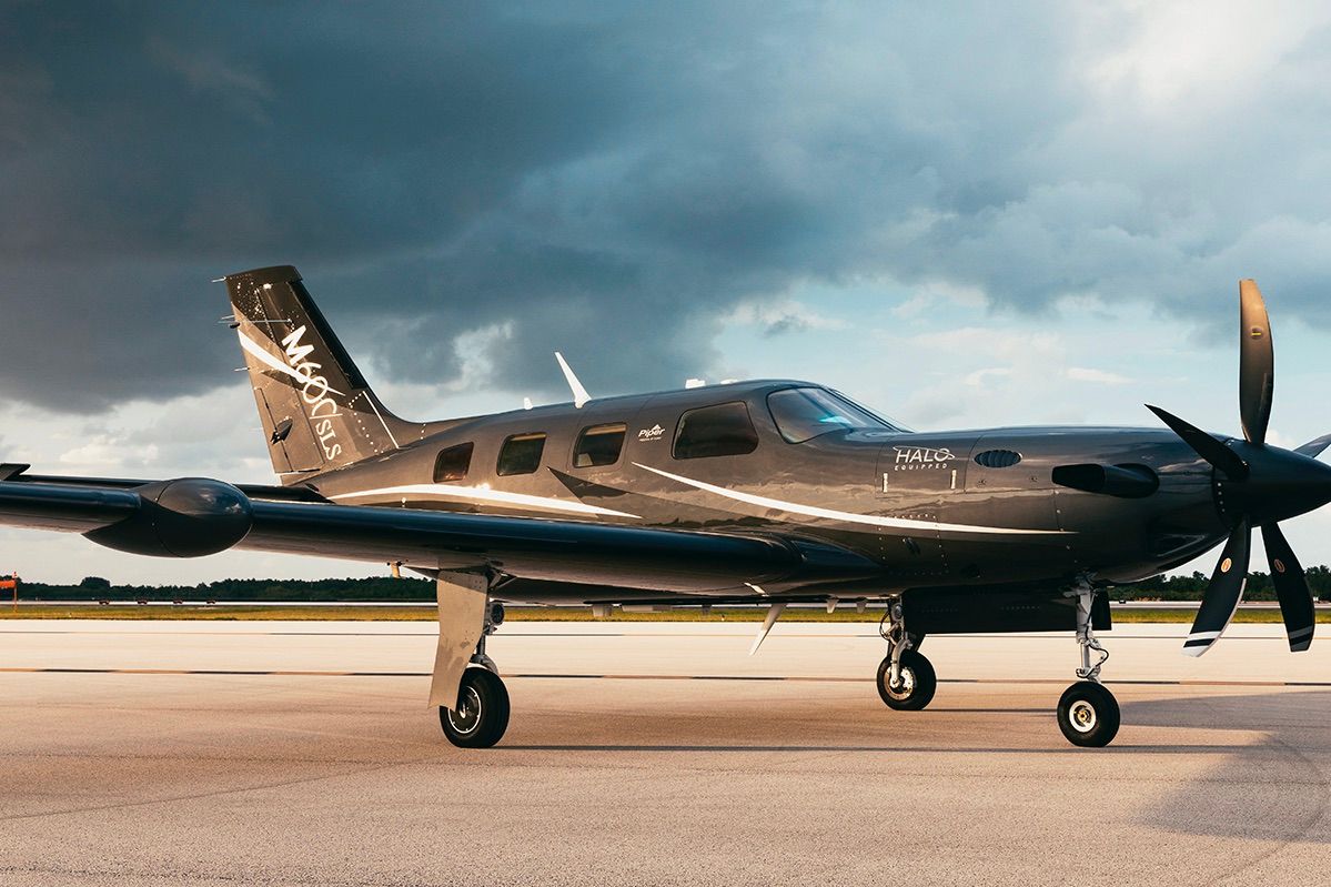 A Piper M600SLS Nighthawk aircraft on an airport apron.