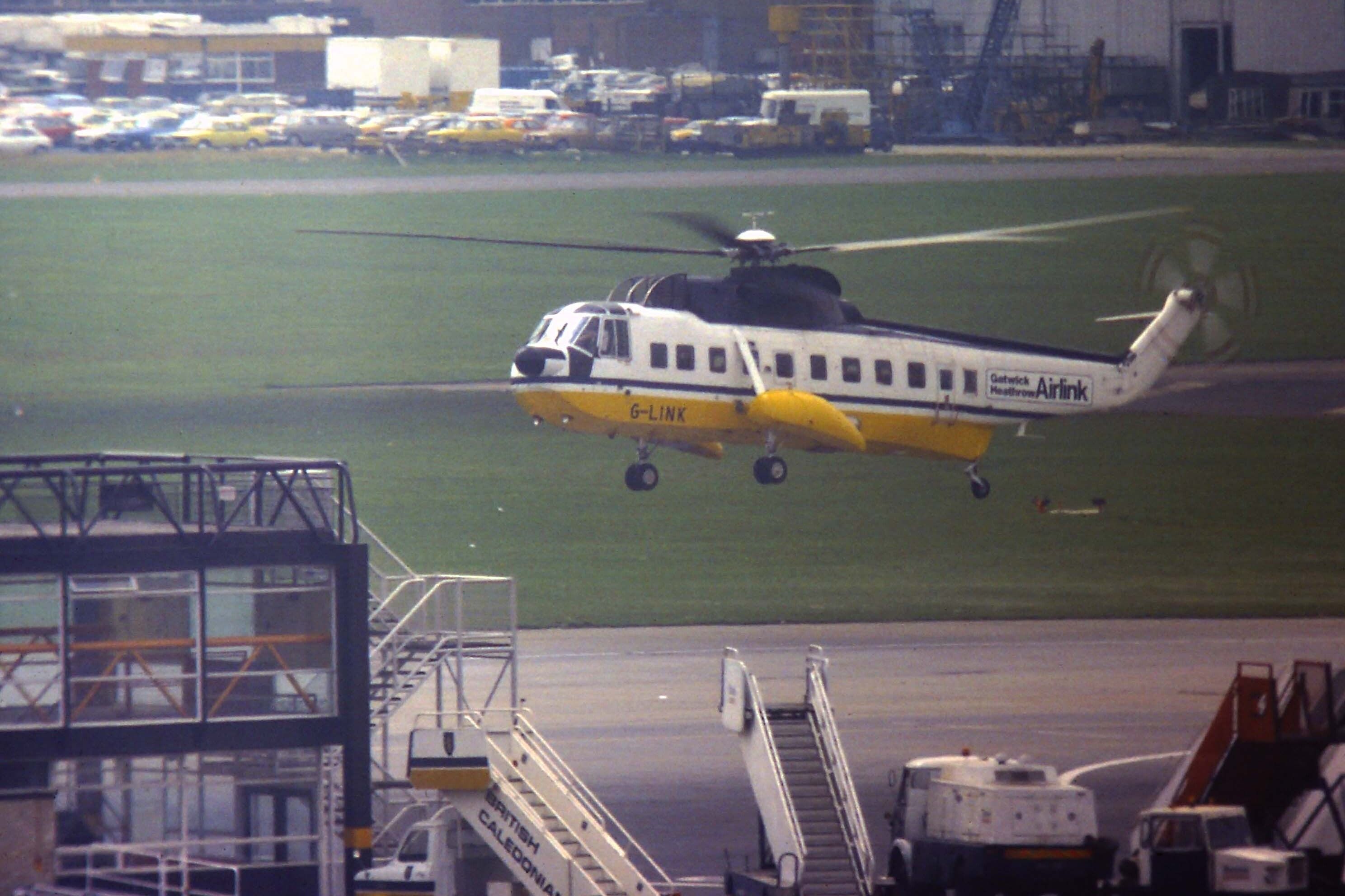 Gatwick - Heathrow's 'Airlink' shuttle in the form of Sikorsky S-61N G-LINK caught arriving by the old South Pier at Gatwick sometime in the mid 1980's.