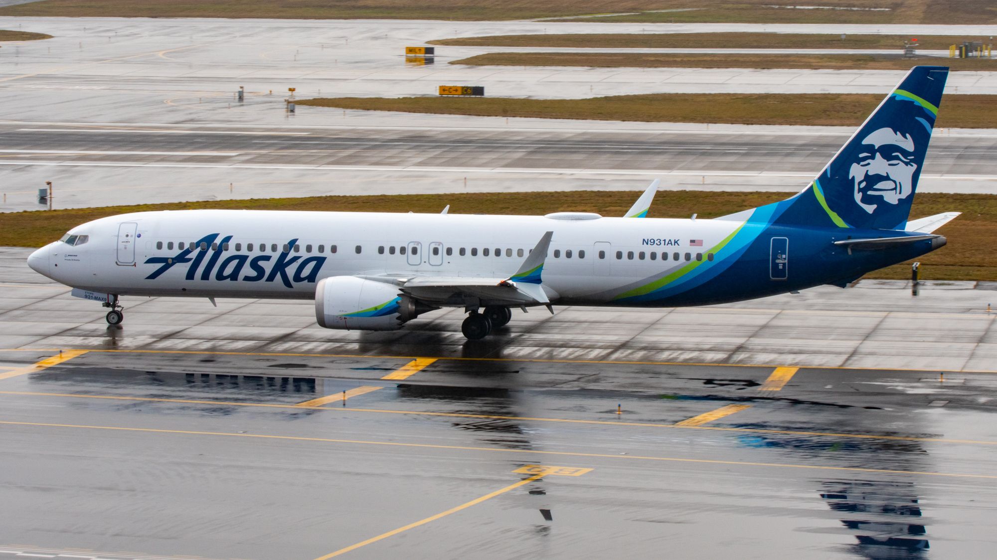 Alaska Airlines Boeing 737 MAX 9 Heading Out on Wet PDX Taxiway.