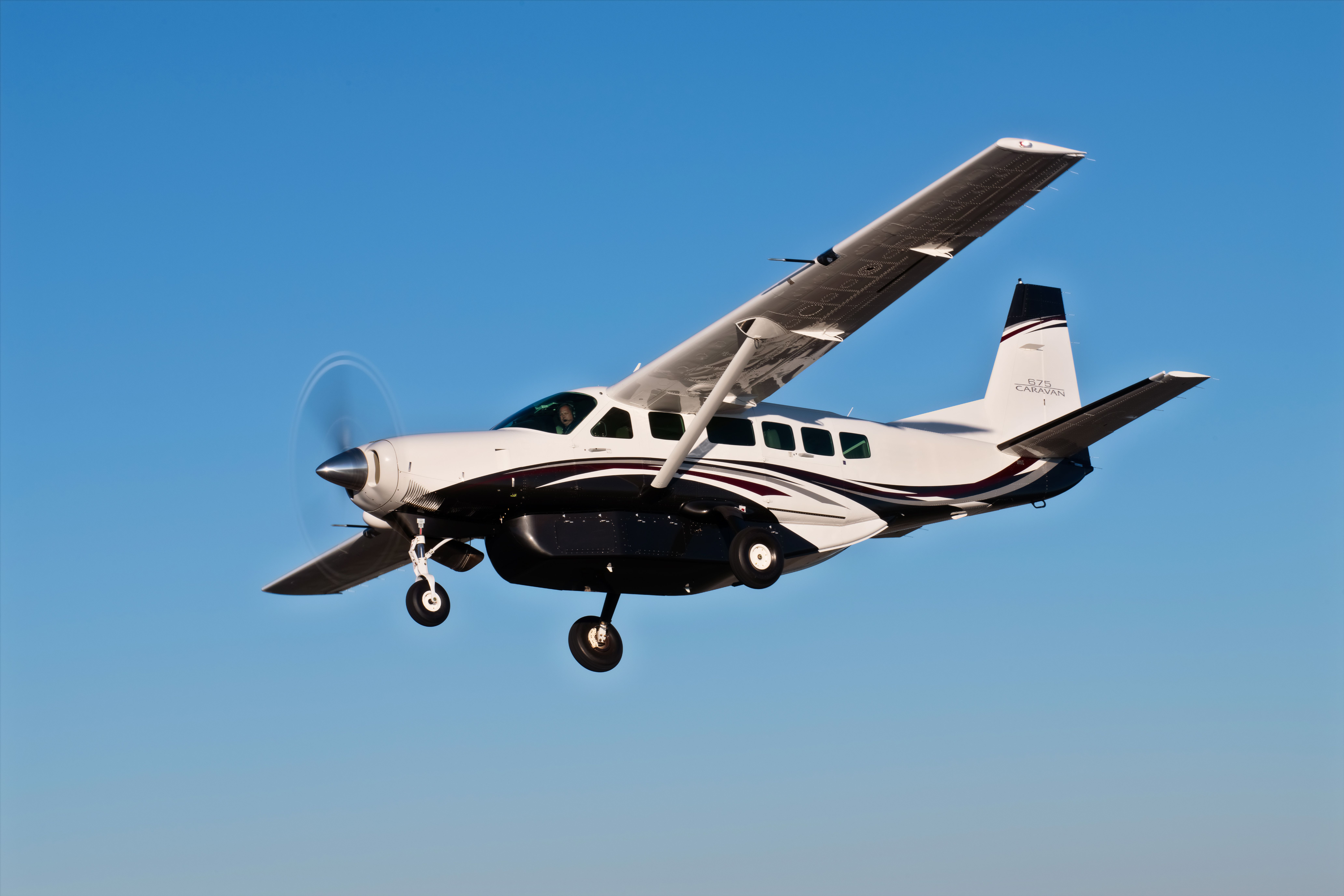 A Cessna Grand Caravan Flying in the sky.