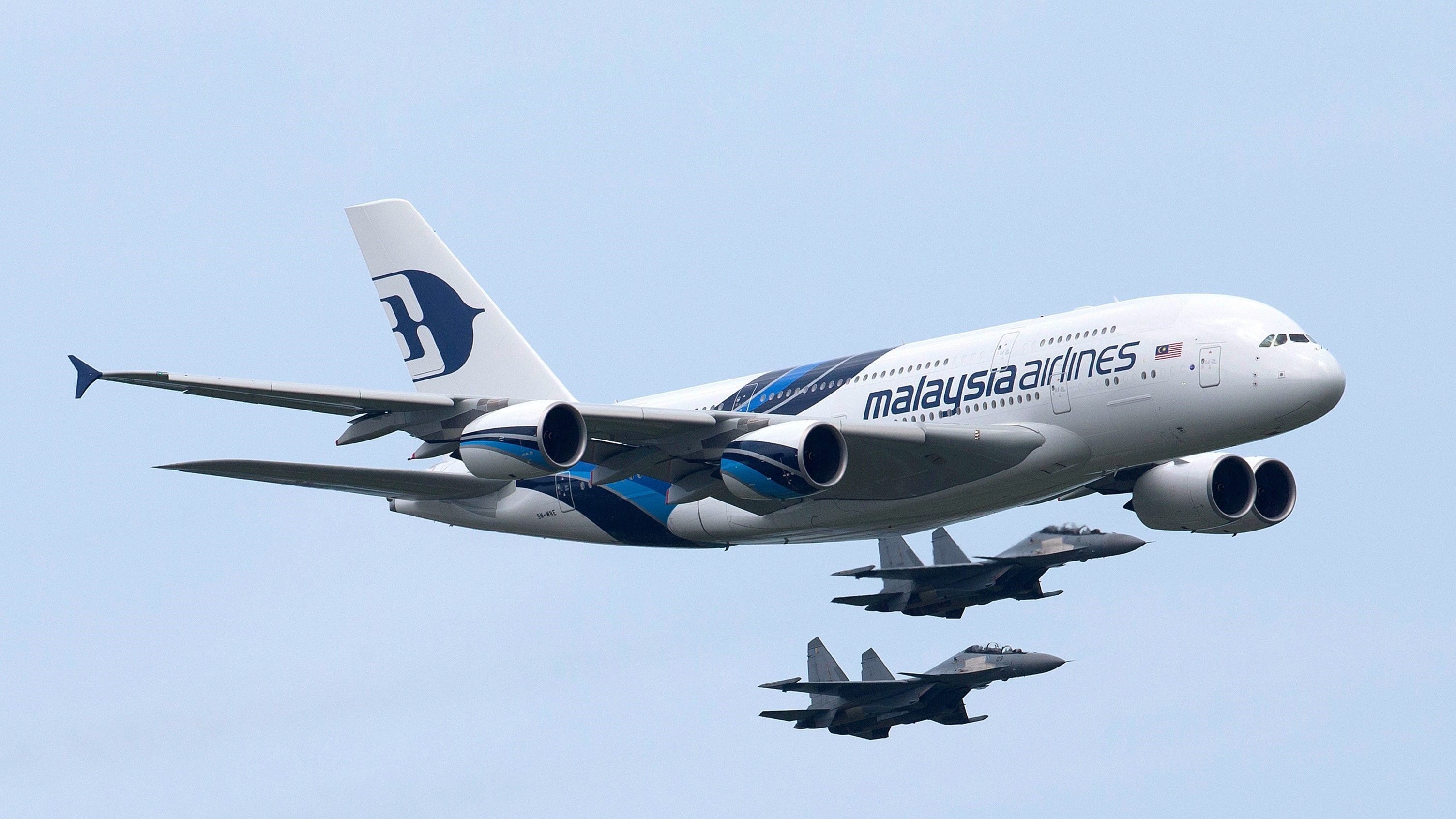 Malaysia Airlines Airbus A380 Flying With Fighter Jets