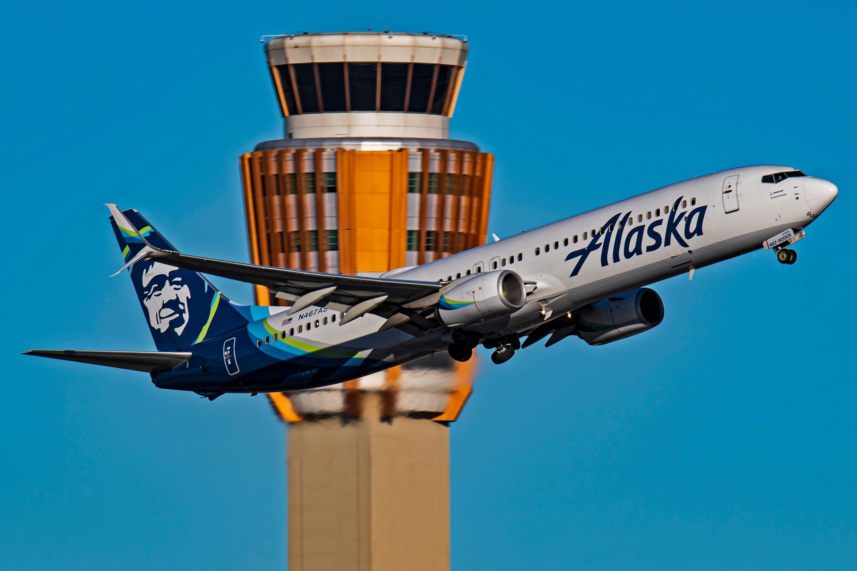 An Alaska Airlines Boeing 737-900ER taking off from Pheonix Sky Harbor International Airport.