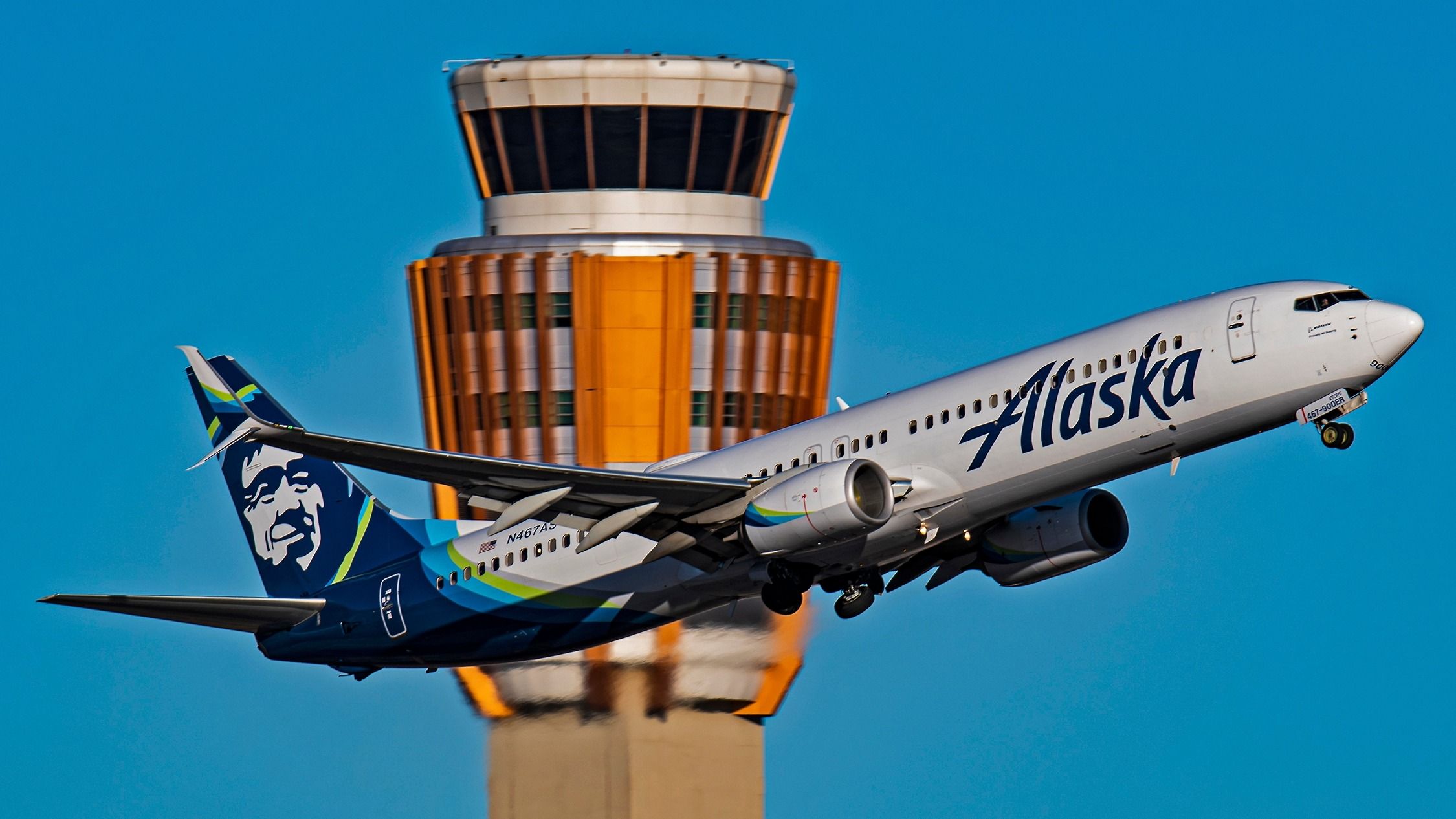 An Alaska Airlines Boeing 737-900ER taking off from Pheonix Sky Harbor International Airport.