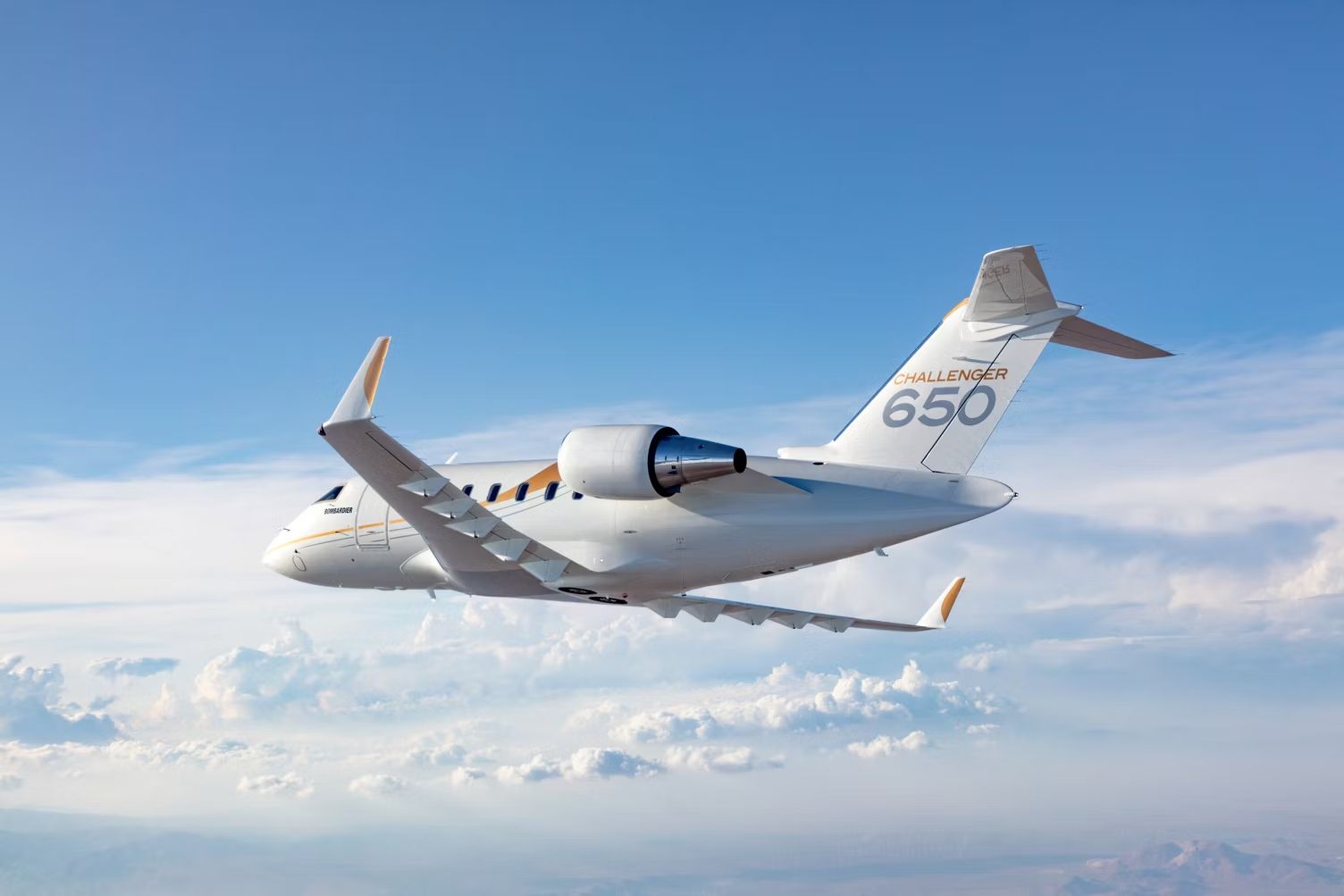 A Bombardier Challenger 650 flying in the sky.