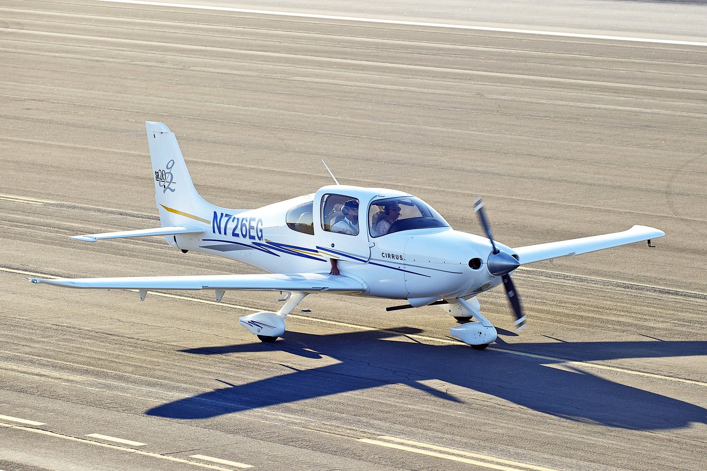 A Cirrus SR20 on a runway.