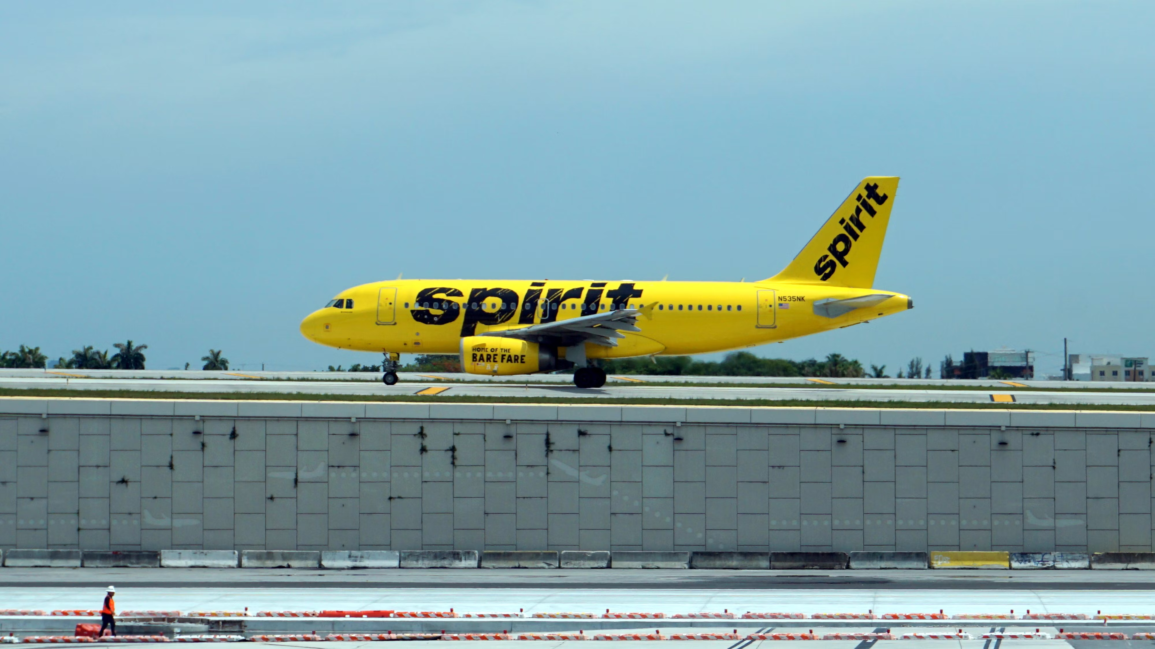 A Spirit Airlines aircraft on the runway at Fort Lauderdale–Hollywood International Airport.