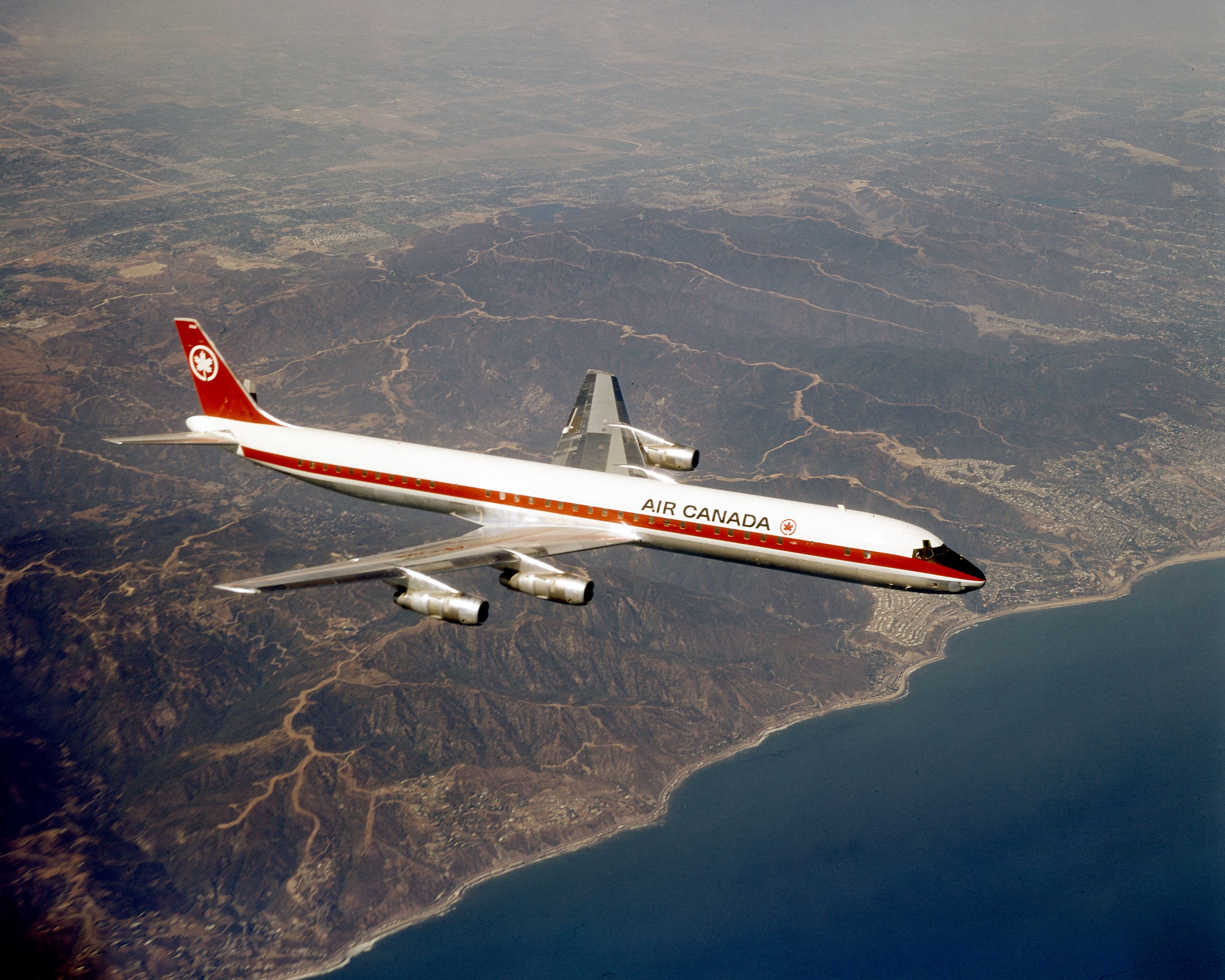 An Air Canada Douglas DC-8-61 Flying in the sky.