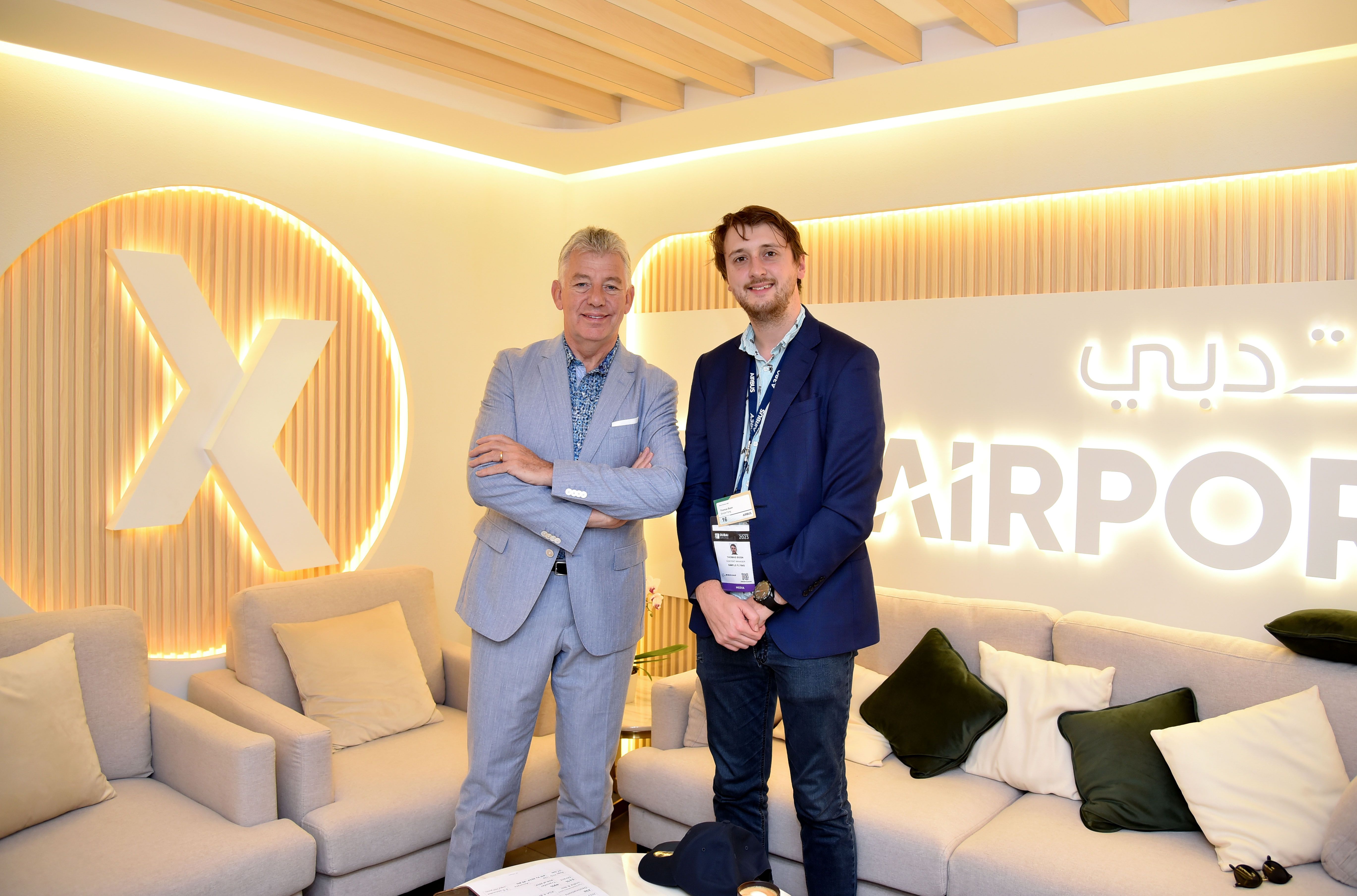 Simple Flying Content Manager Tom Boon poses with Dubai Airports CEO Paul Griffiths