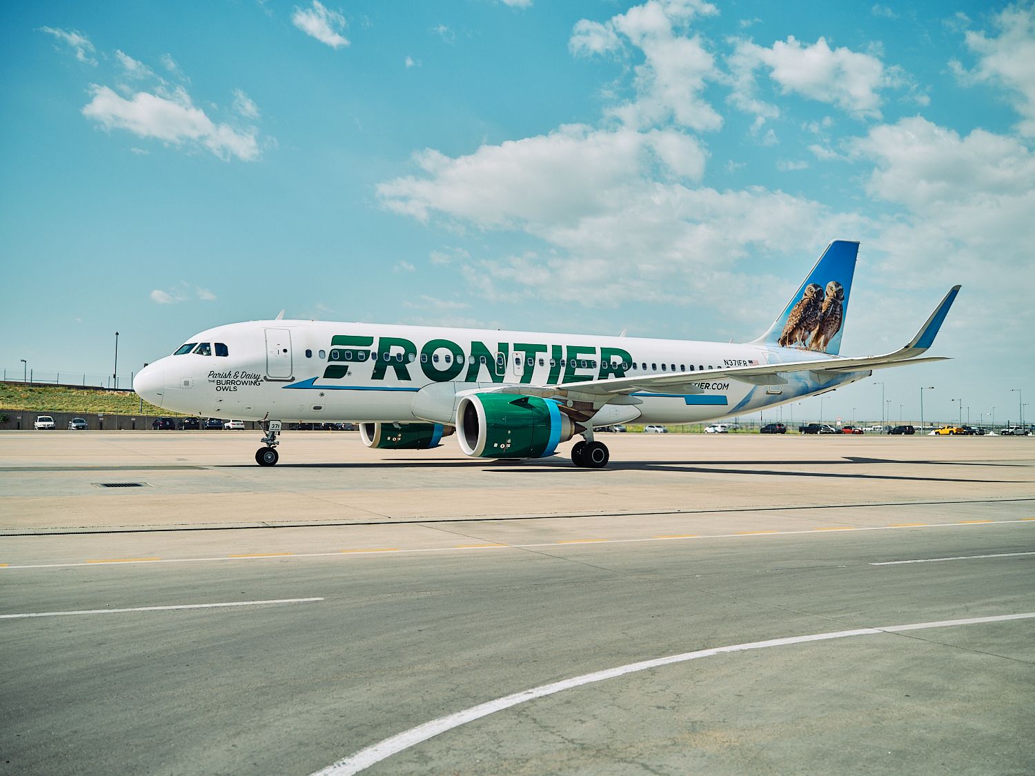 A Frontier Airlines A320neo on an airport apron.