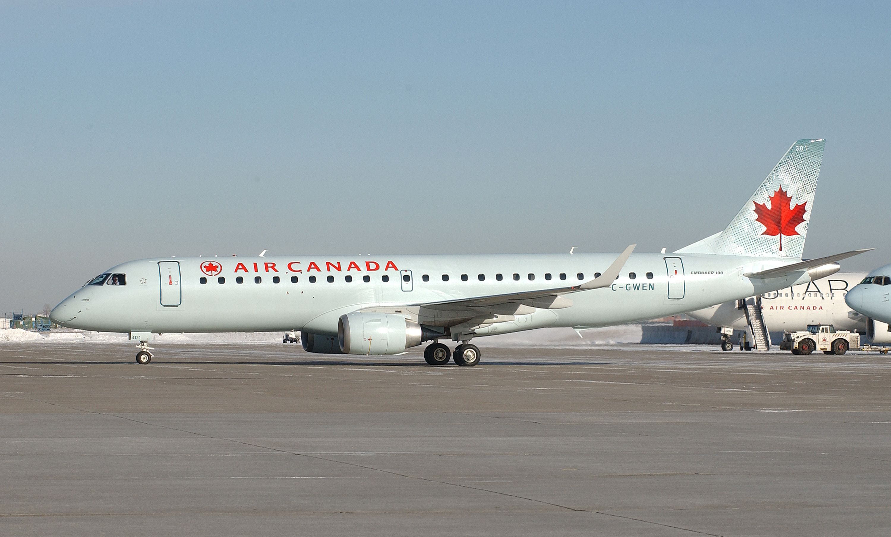An Air Canada Embraer E190 On an airport apron.