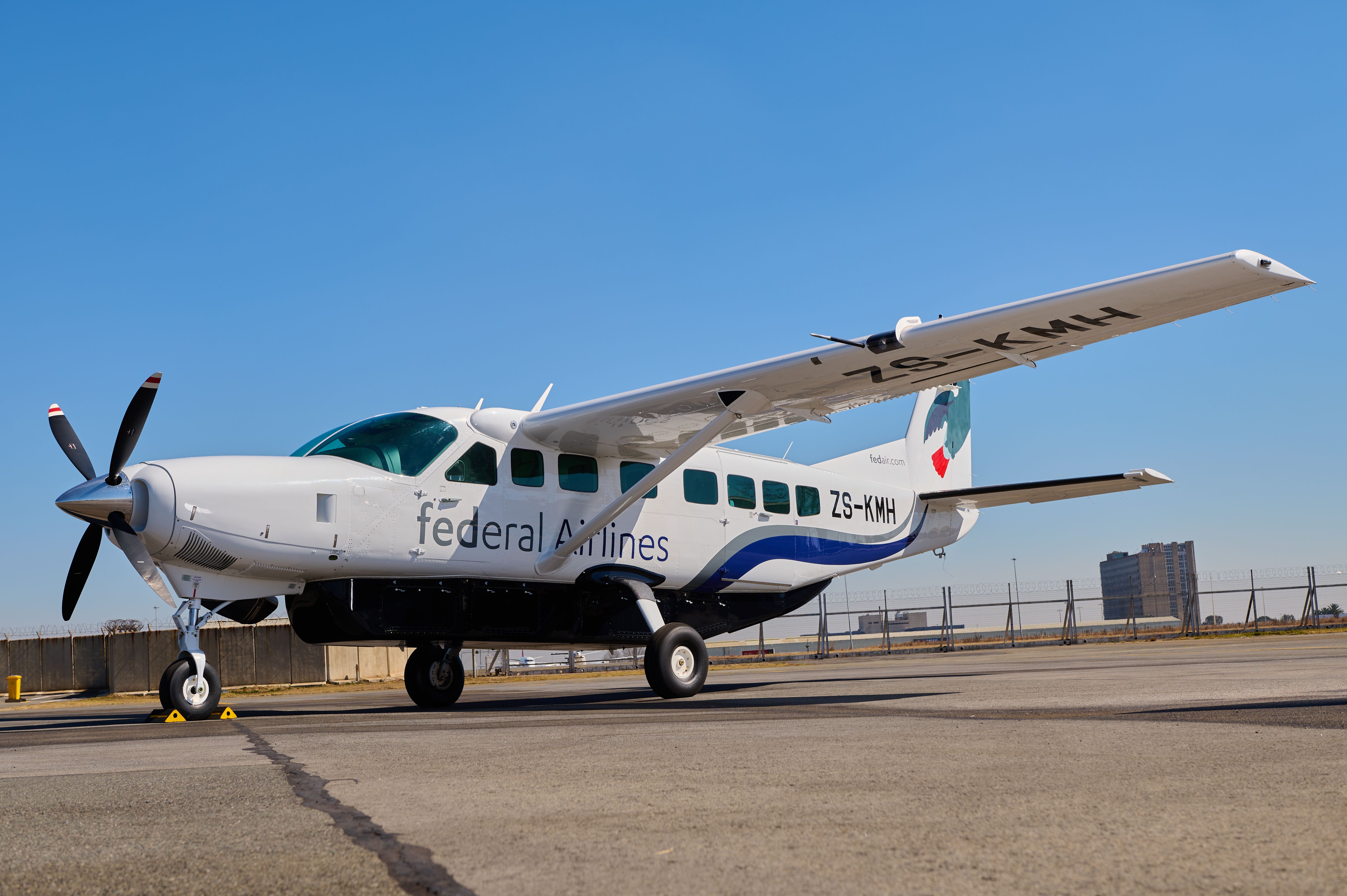 A Federal Airlines Cessna Grand Caravan on an airport apron.