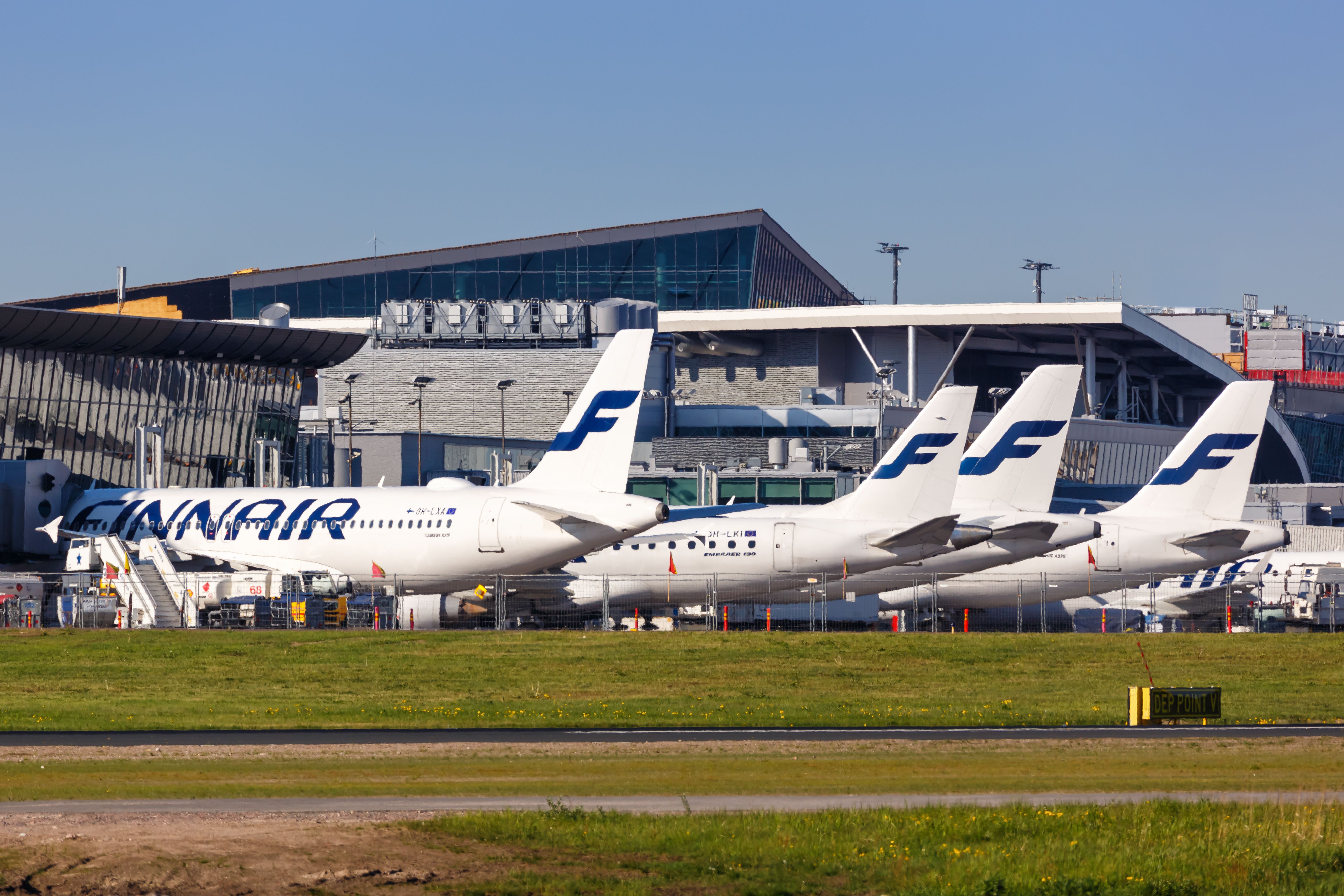 Finnair aircraft parked at the gates at Helsinki Airport HEL