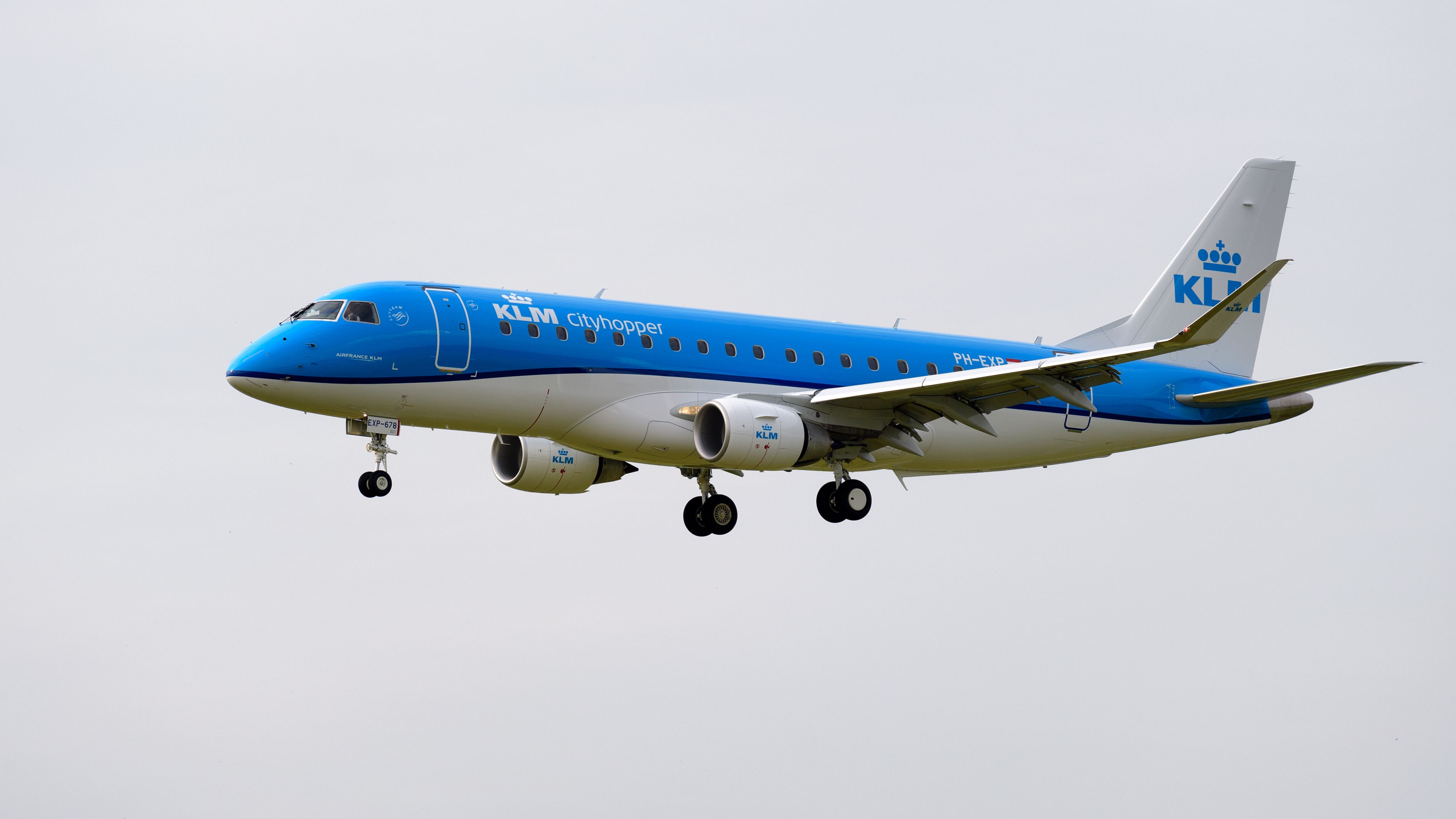 A KLM Cityhopper Embraer E175 Flying in the sky.