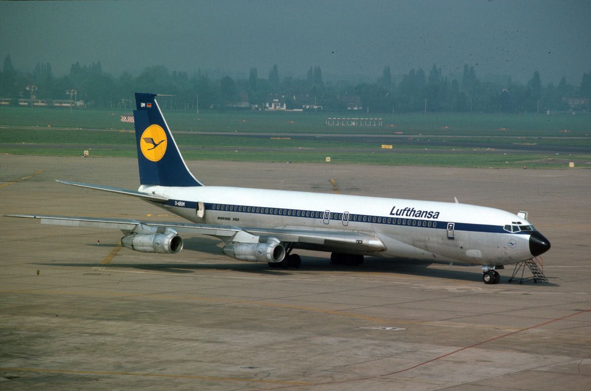 A Lufthansa Boeing 707 on an airport apron.