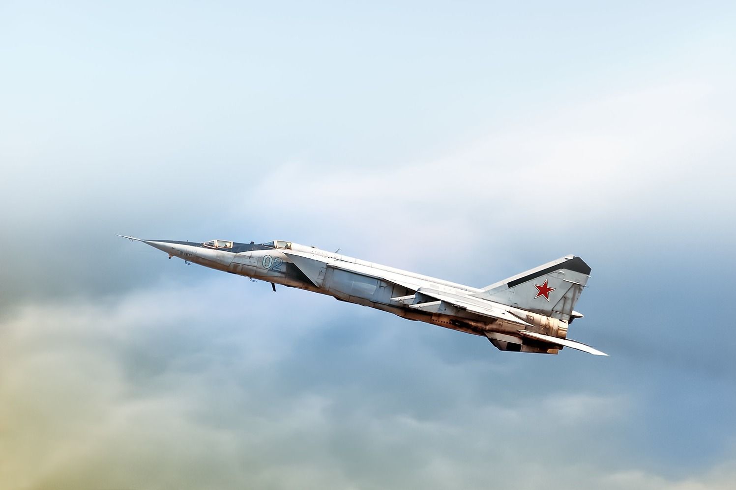 MiG-25 flying shutterstock_506171842