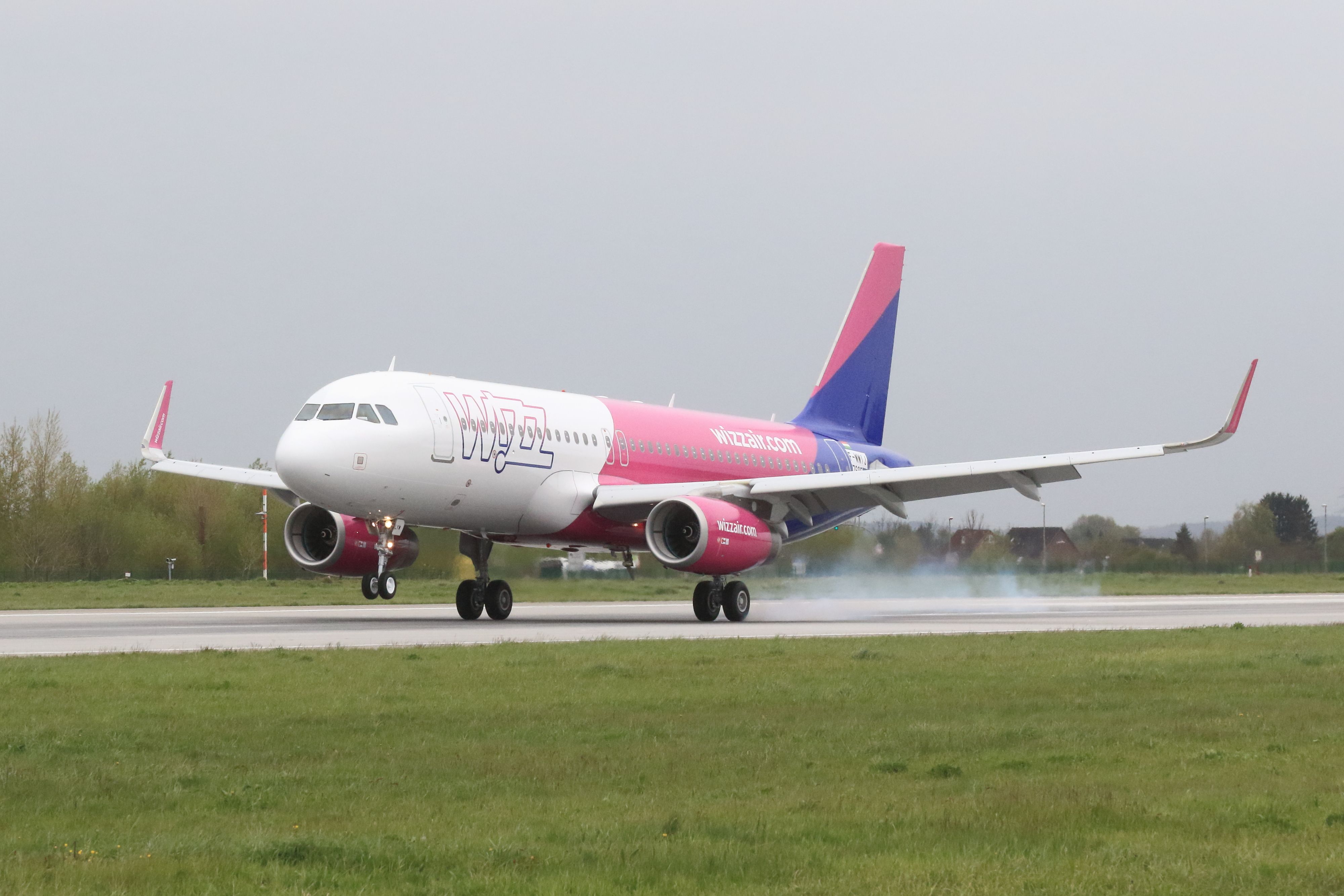Wizz Air Airbus A320 Landing In Cloudy Conditions