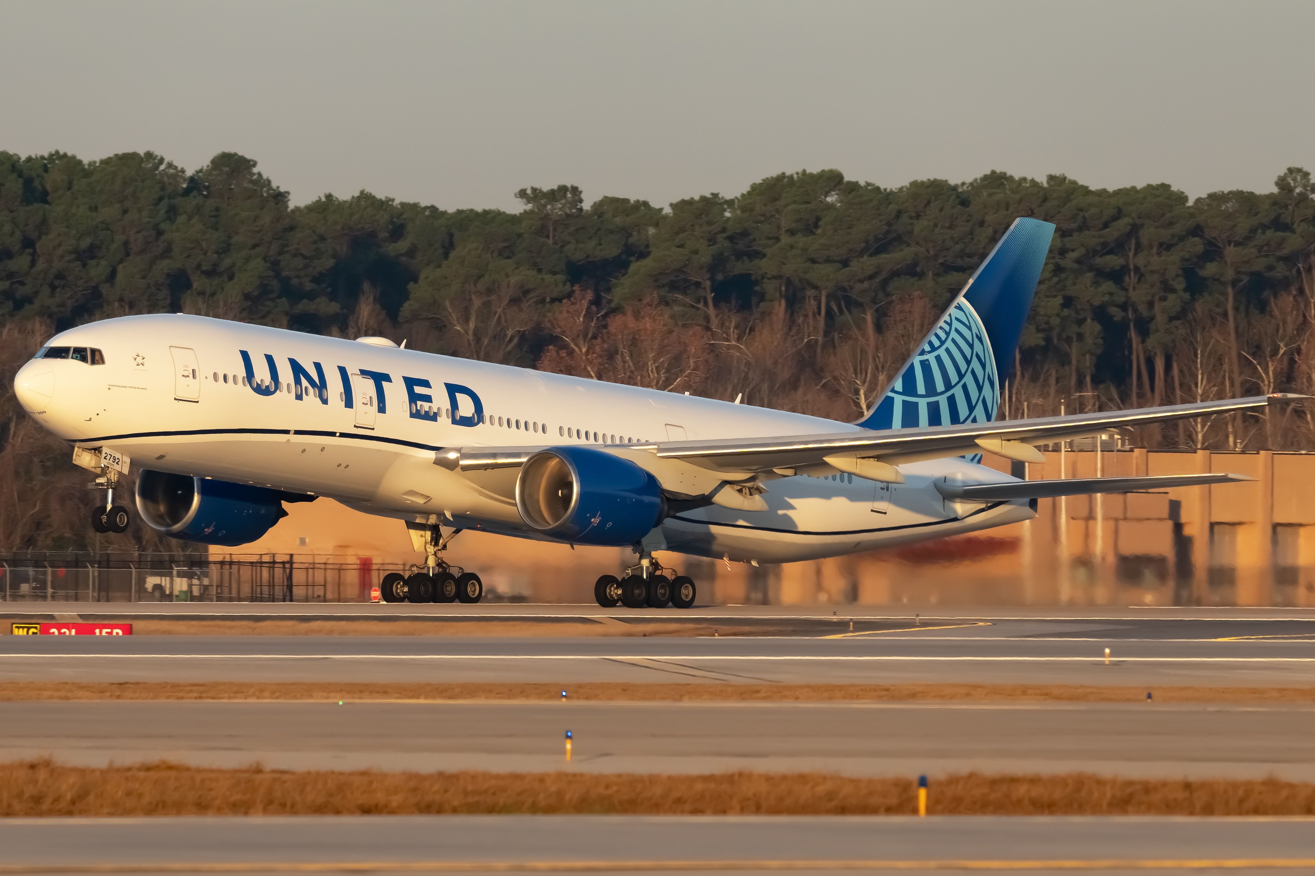 United Airlines Boeing 777 aircraft landing in Houston.