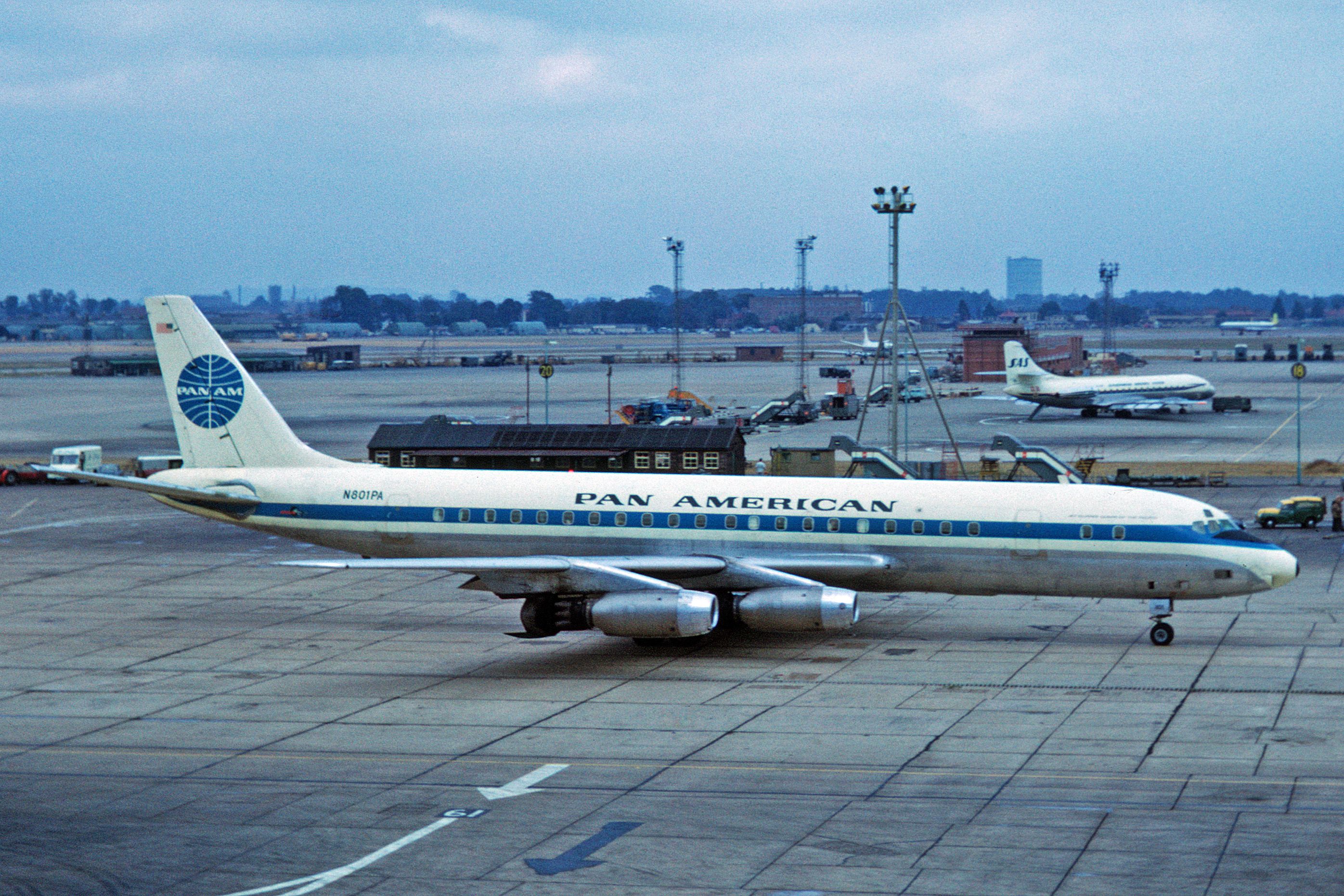A Pan Am Douglas DC-8 parked on the apron at London Heathrow