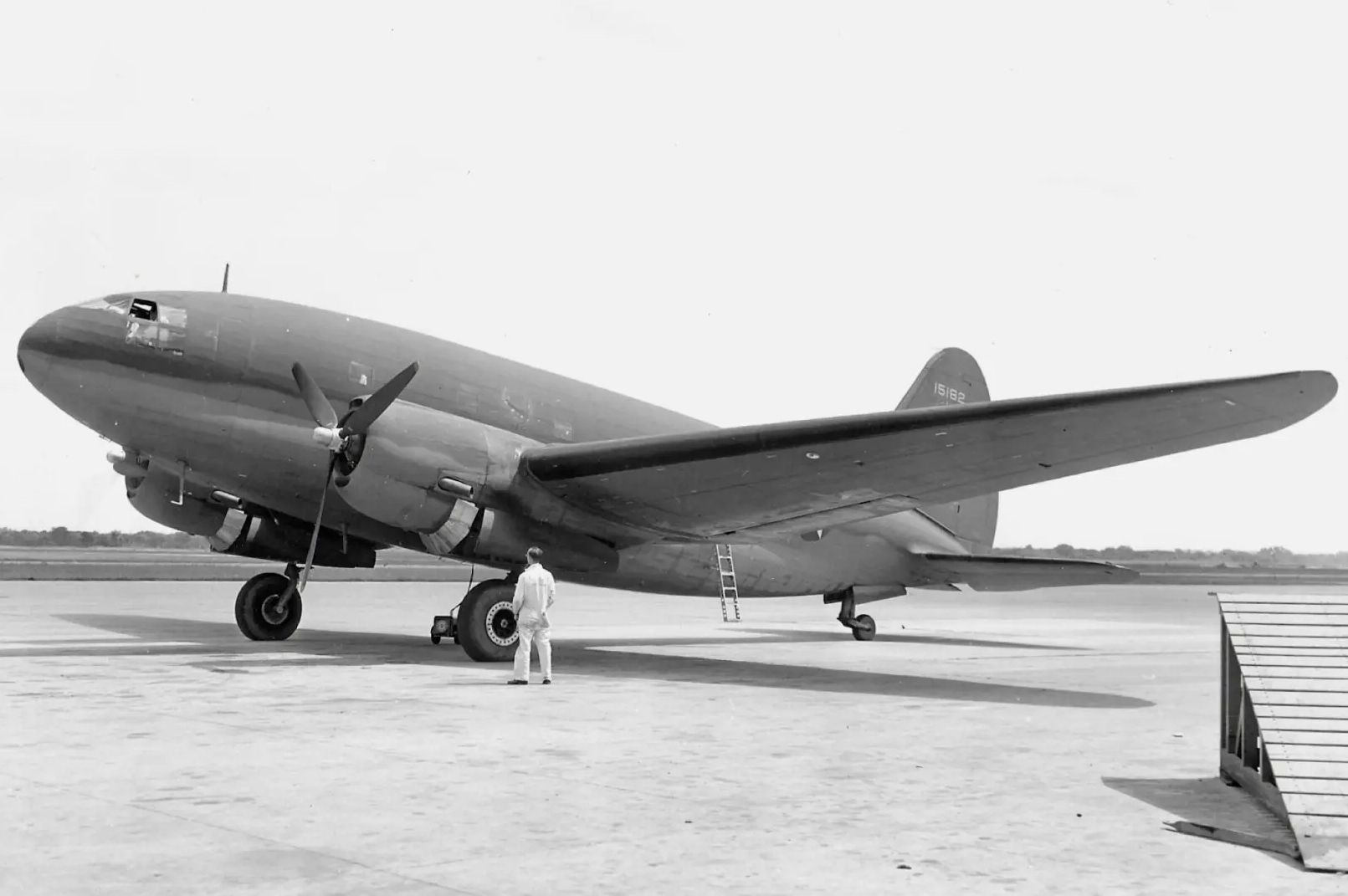 A Northwest Airlines Curtiss C-46 on an airport apron.